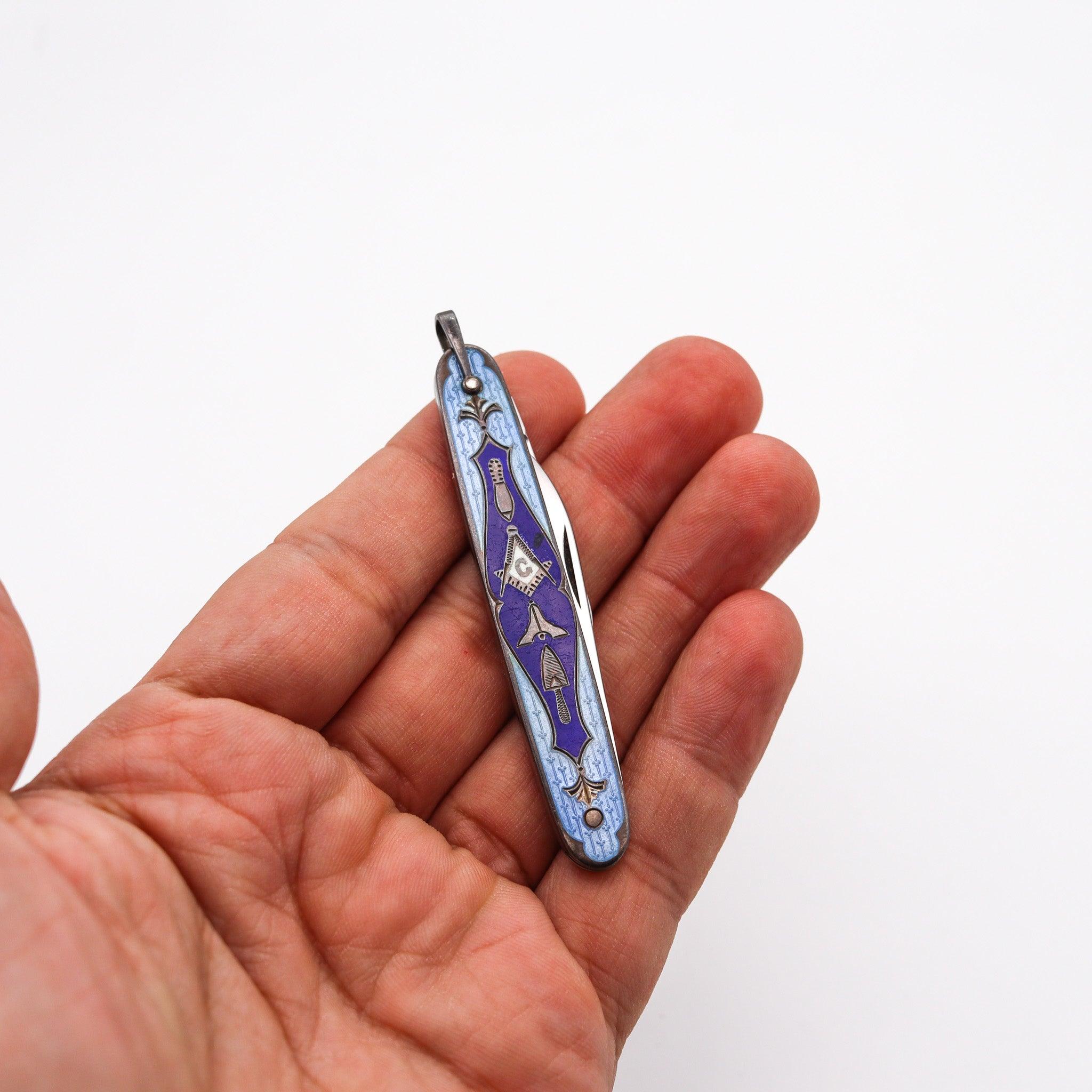 A blue enameled Masonic pocket knife in sterling.

This is a very interesting Masonic pocked knife, created in America back in the 1930. The pocket knife is very unusual and have been crafted with parts in solid .925/.999 sterling silver, and