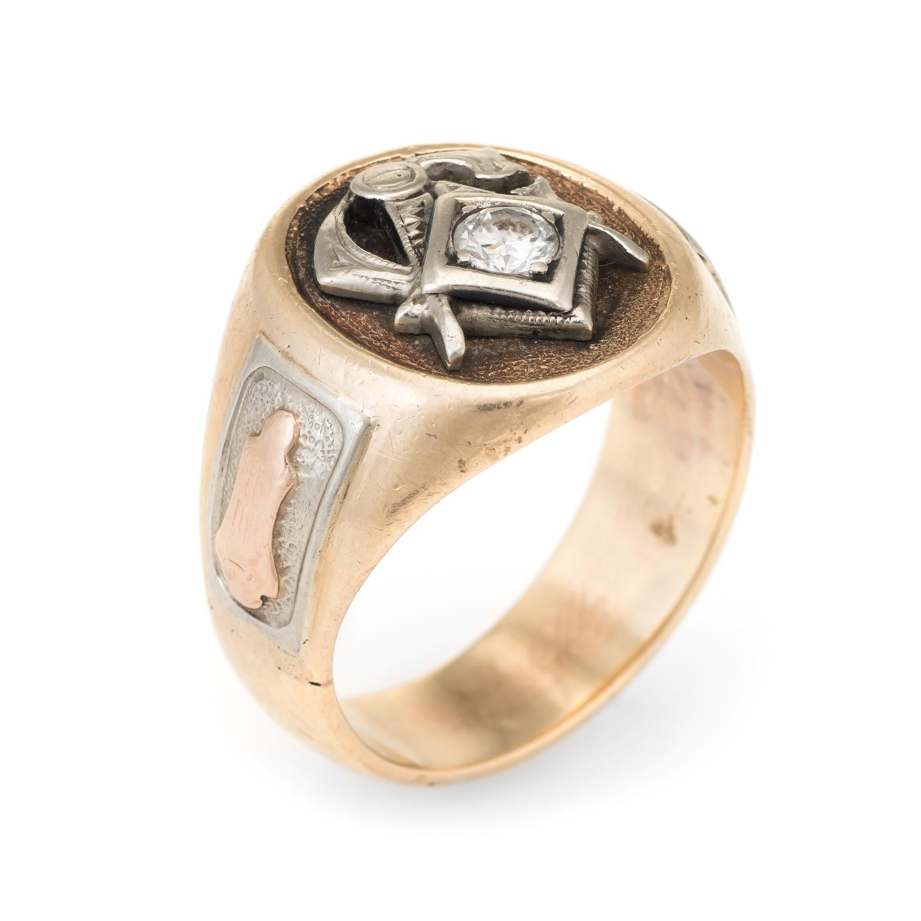 Finely detailed vintage masonic Lodge Fraternal ring, crafted in 10 karat yellow gold.

Centrally mounted estimated 0.25 carat round brilliant cut diamond adorns the mount (estimated at H-I color and VS2-SI1 clarity). 

The ring is in very good