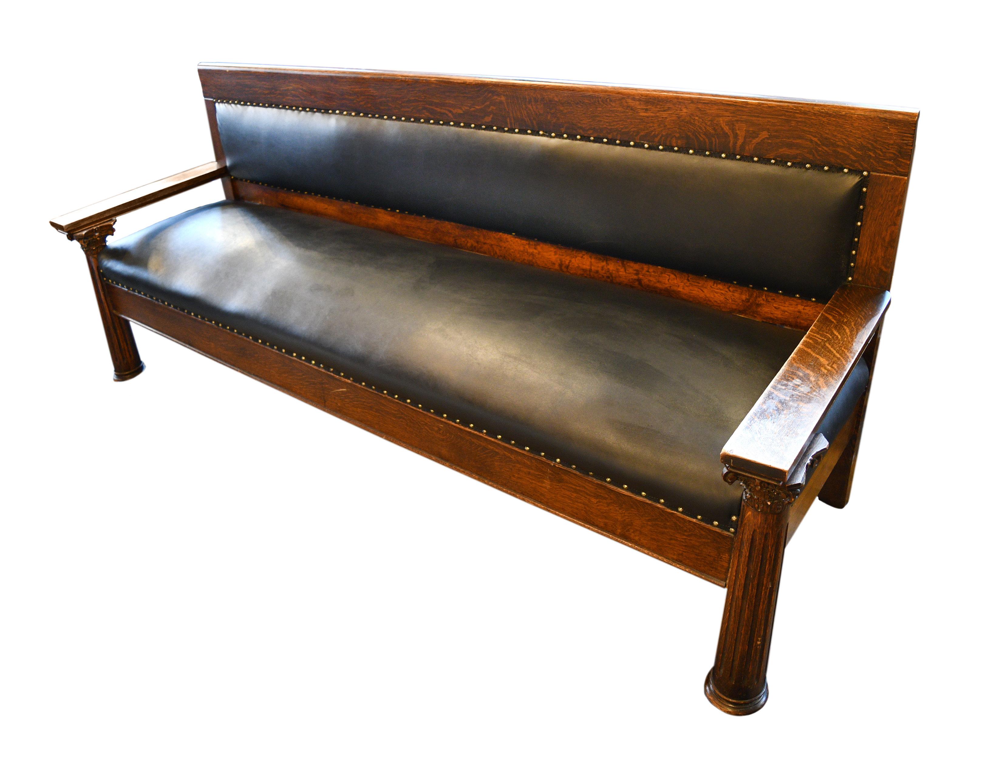 These ultra comfy and stylish upholstered benches feature two lovely hand carved oak columns on each end. At over 8 feet long these benches offer ample seating for you and all your loved ones!

Condition: Good
Finish: Original
Material: Oak/faux