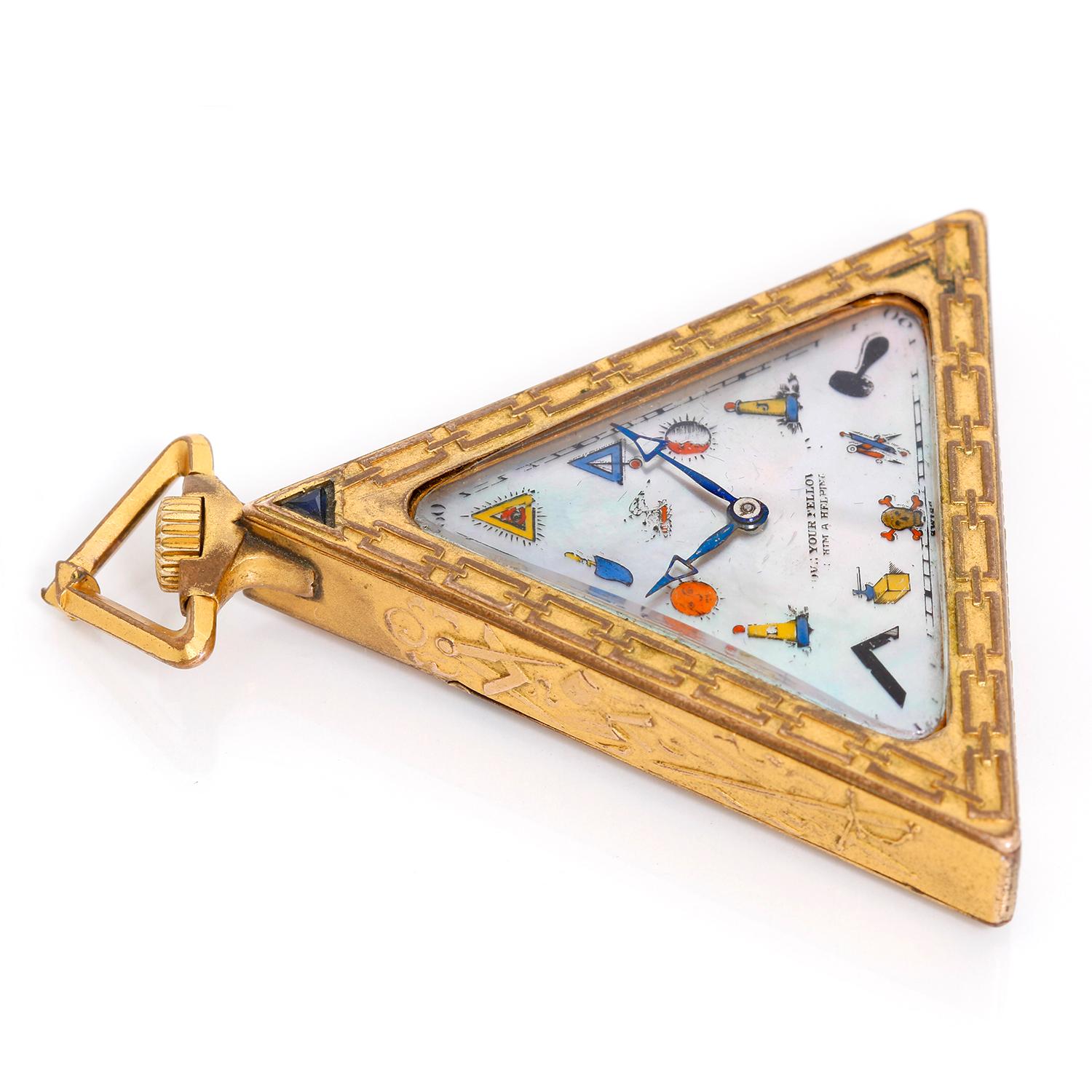Masonic Mother of Pearl Gilt Pocket Watch Circa 1920's - Manual winding; Movement made by Timpor Watch Co. 15 jewels. Gilt case  with Masonic symbols; Triangular blue stone below the pendant ( 51 x 51 x 51 mm ) . Mother of Pearl dial with printed