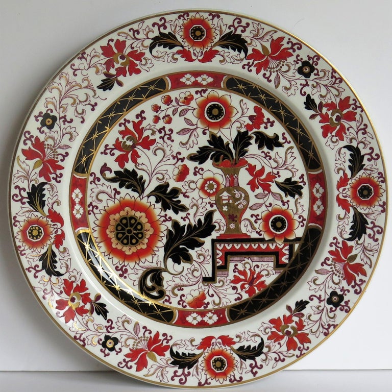 This is a mid-19th century Mason’s ironstone Dinner Plate produced at the time when Mason's was owned and controlled by George L Ashworth after the bankruptcy of C J Mason in 1848.

This large plate is decorated in a striking chinoiserie pattern