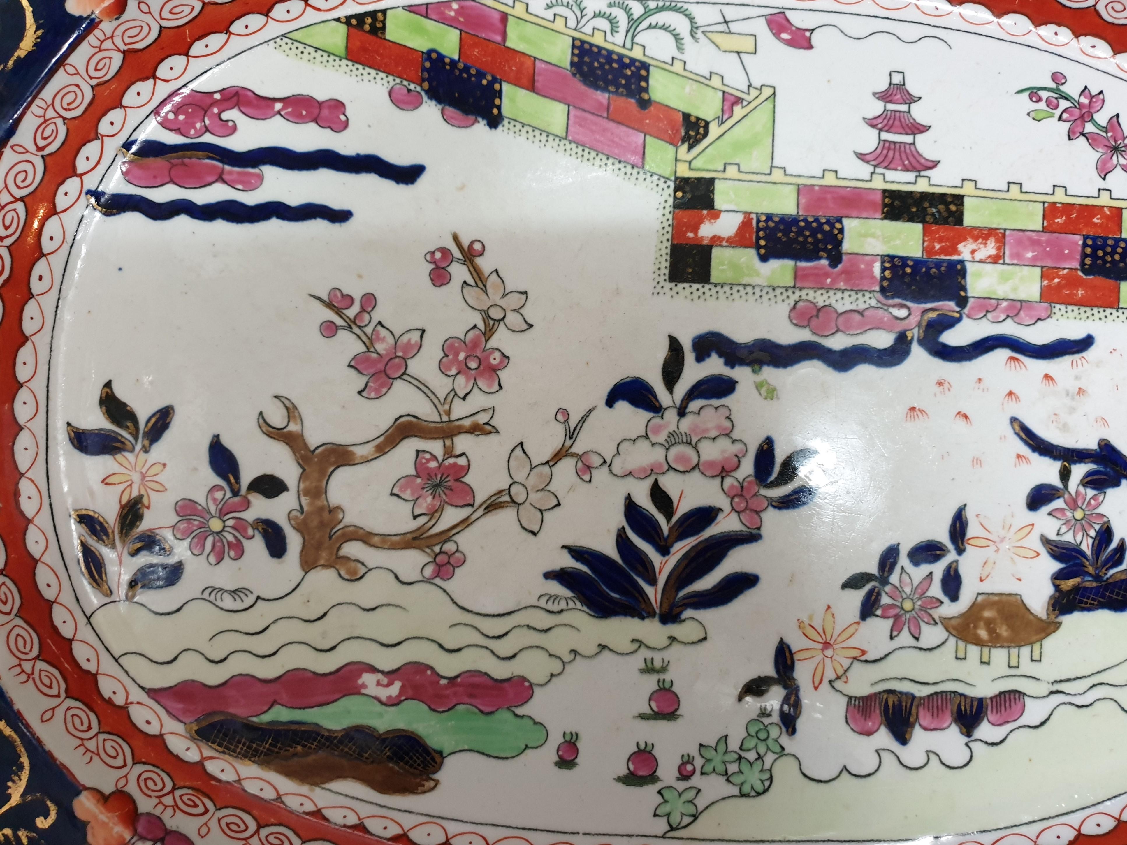 An fine and large early-19th century Mason’s patent ironstone Platter produced by Mason's Ironstone, England and dating to their earliest period, circa 1815 to 1820's .
It is beautifully hand decorated in a striking chinoiserie pattern called