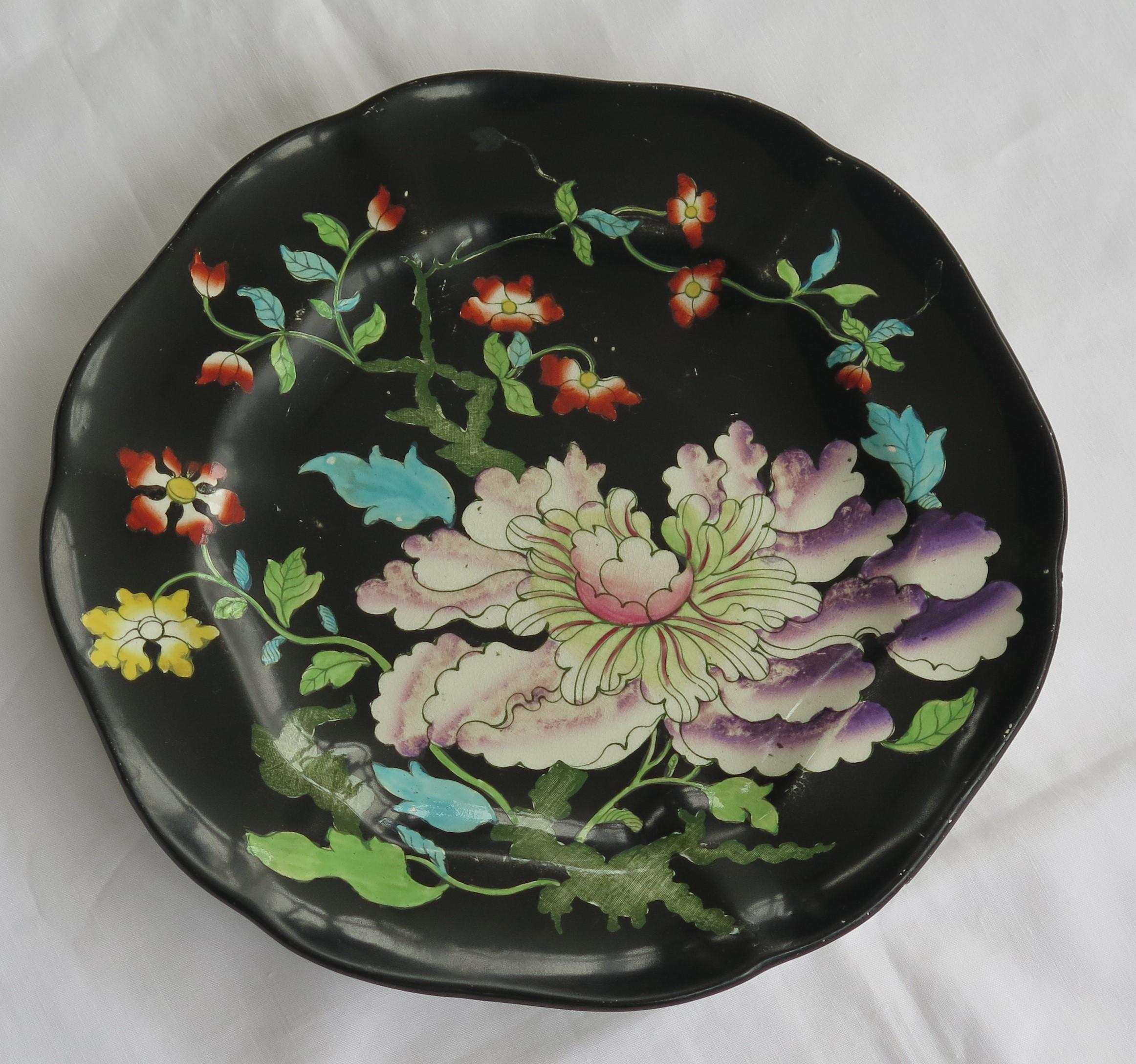 This is a very good, dinner plate by Mason's ironstone, England in a very decorative, hand painted floral pattern, dating to circa 1845. 

This is a rare pattern.

The Plate is circular in shape with a wavy moulded edge.

This plate has a