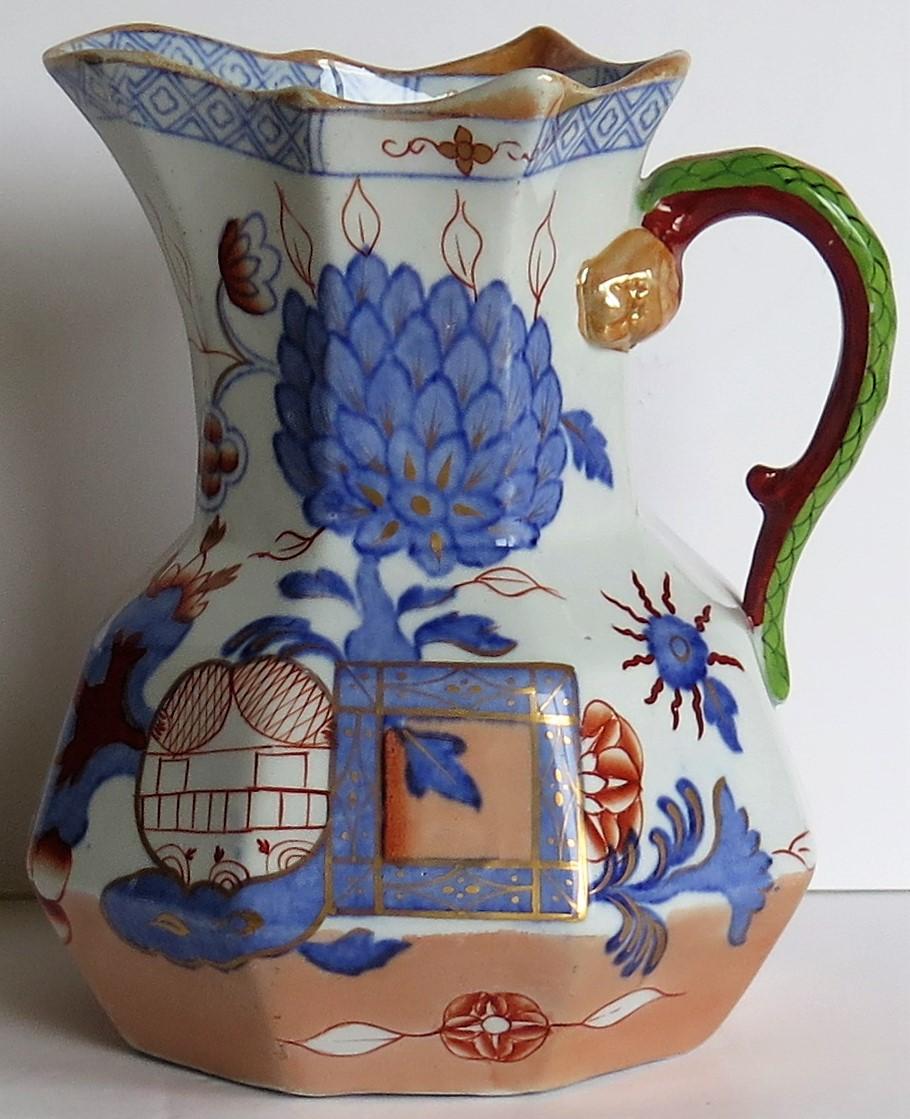 This is a very good Ironstone hydra jug or pitcher in the jardinière pattern and made by Mason's Ironstone, England, circa 1870.

The pattern is a known Mason's chinoiserie pattern called 