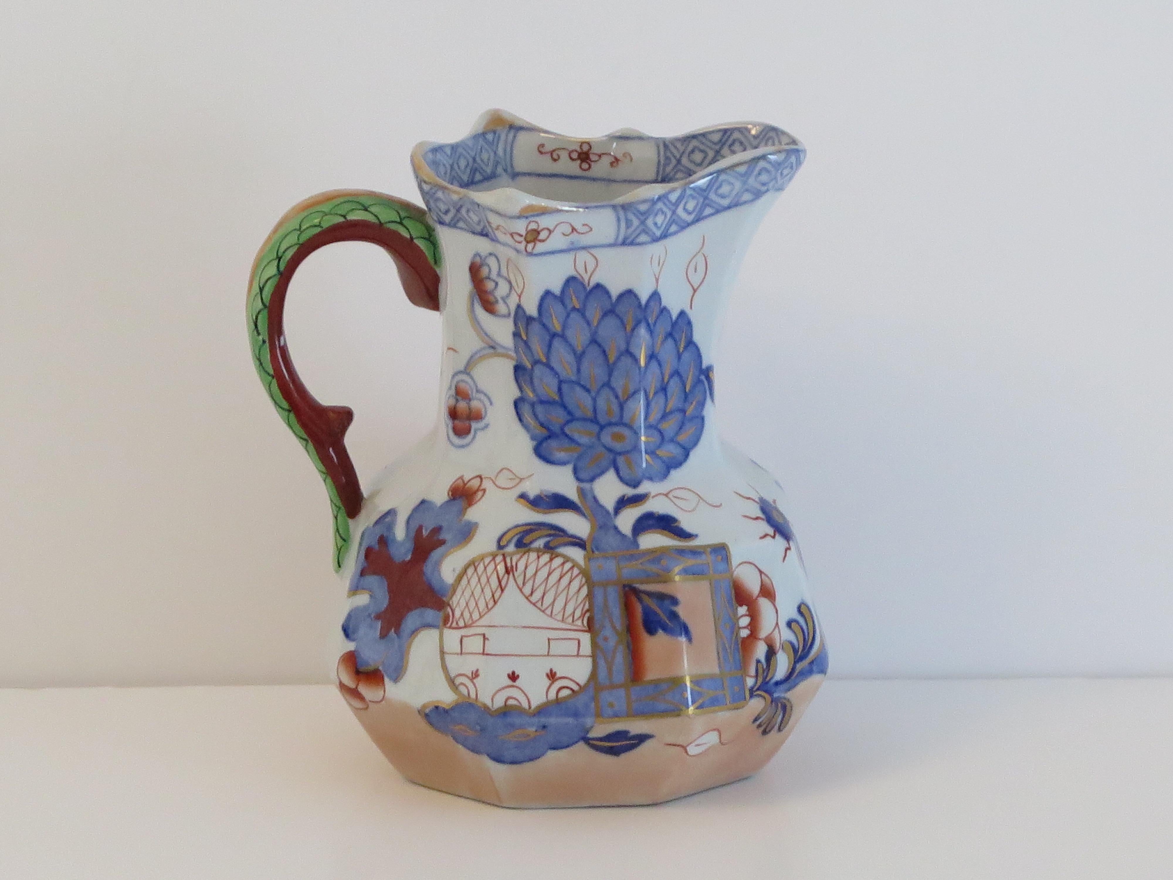 This is a very good Ironstone hydra jug or pitcher in the jardinière pattern and made by Mason's Ironstone, England, circa 1870.

The pattern is a known Mason's chinoiserie pattern called 