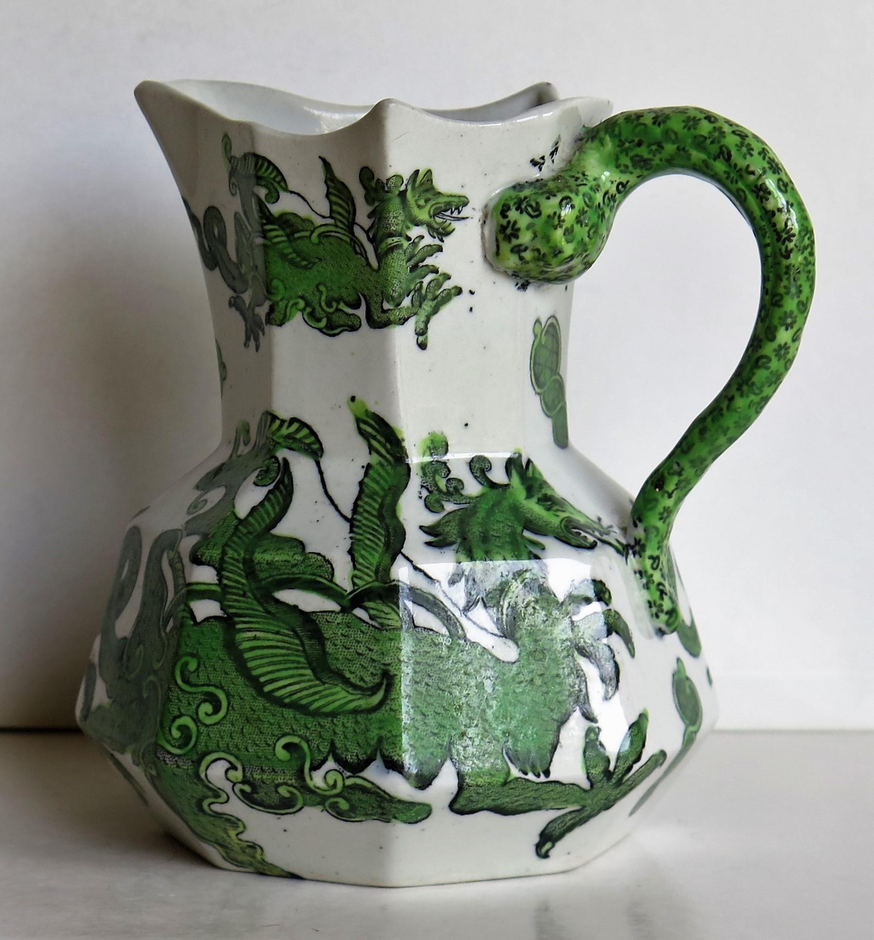 This is a very good Hydra jug or pitcher, made by Mason's Ironstone, England in the 19th century, circa 1870. 

The jug is octagonal in shape with the snake handle. These jugs were made in a range of sizes, varying from a small of under three