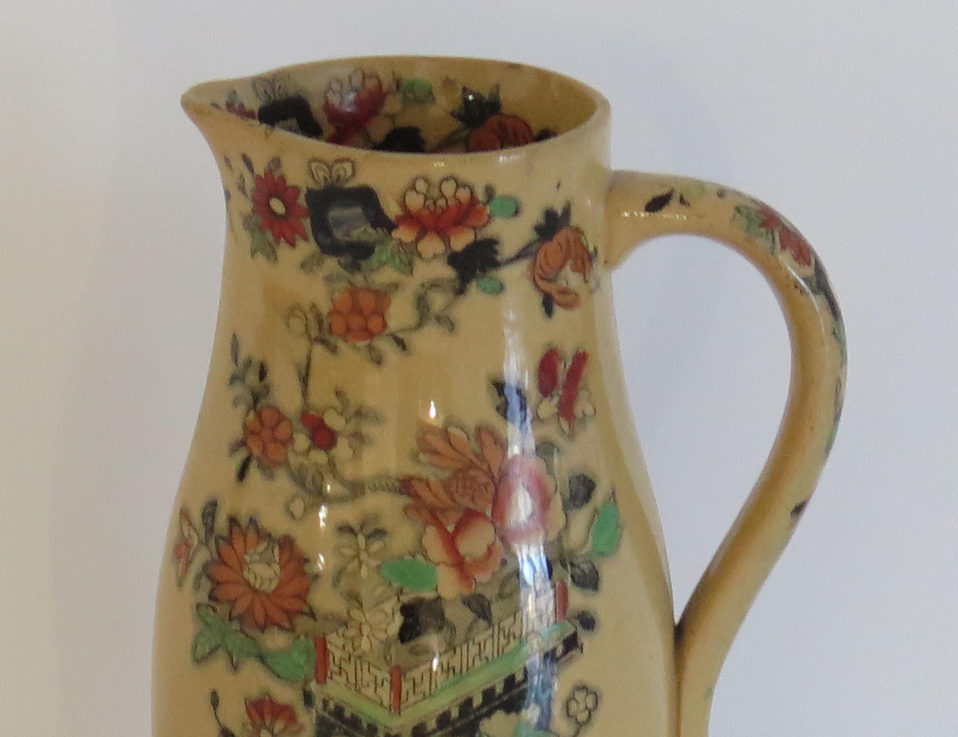 This is rare shape jug or pitcher by Mason's Ironstone pottery in the flower box pattern all dating to the mid-19th century, circa 1830-1851 Victorian period.

This Mason's jug also has a rare pattern, with a beautiful ochre glaze having beautiful