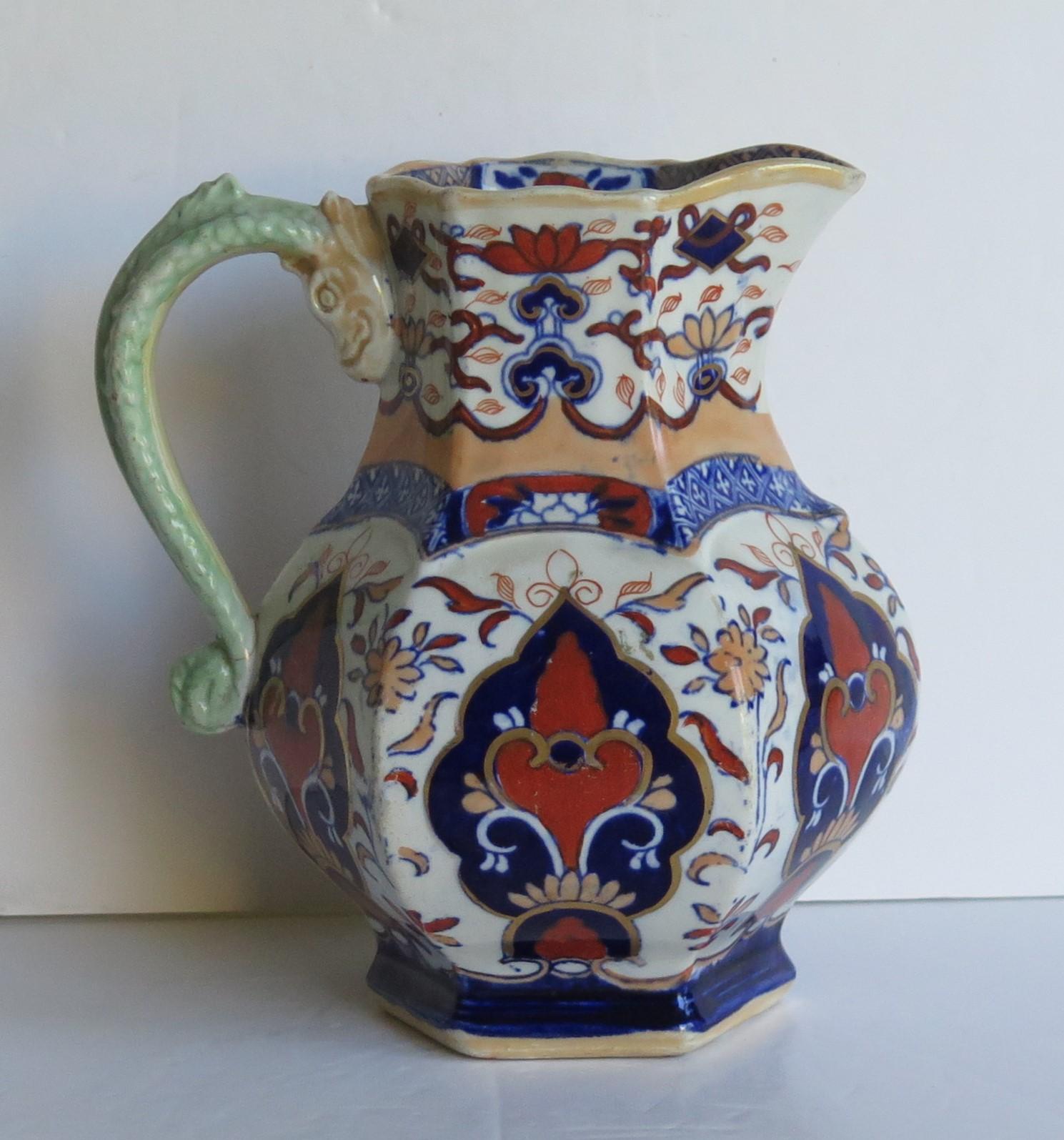 This is a very decorative fairly large & well hand painted, Jug or Pitcher made by Mason's ironstone pottery, circa 1830.

It has a rare shape and pattern.

A jug of the same shape and pattern is illustrated on Page 192, Plate 245 of Godden's