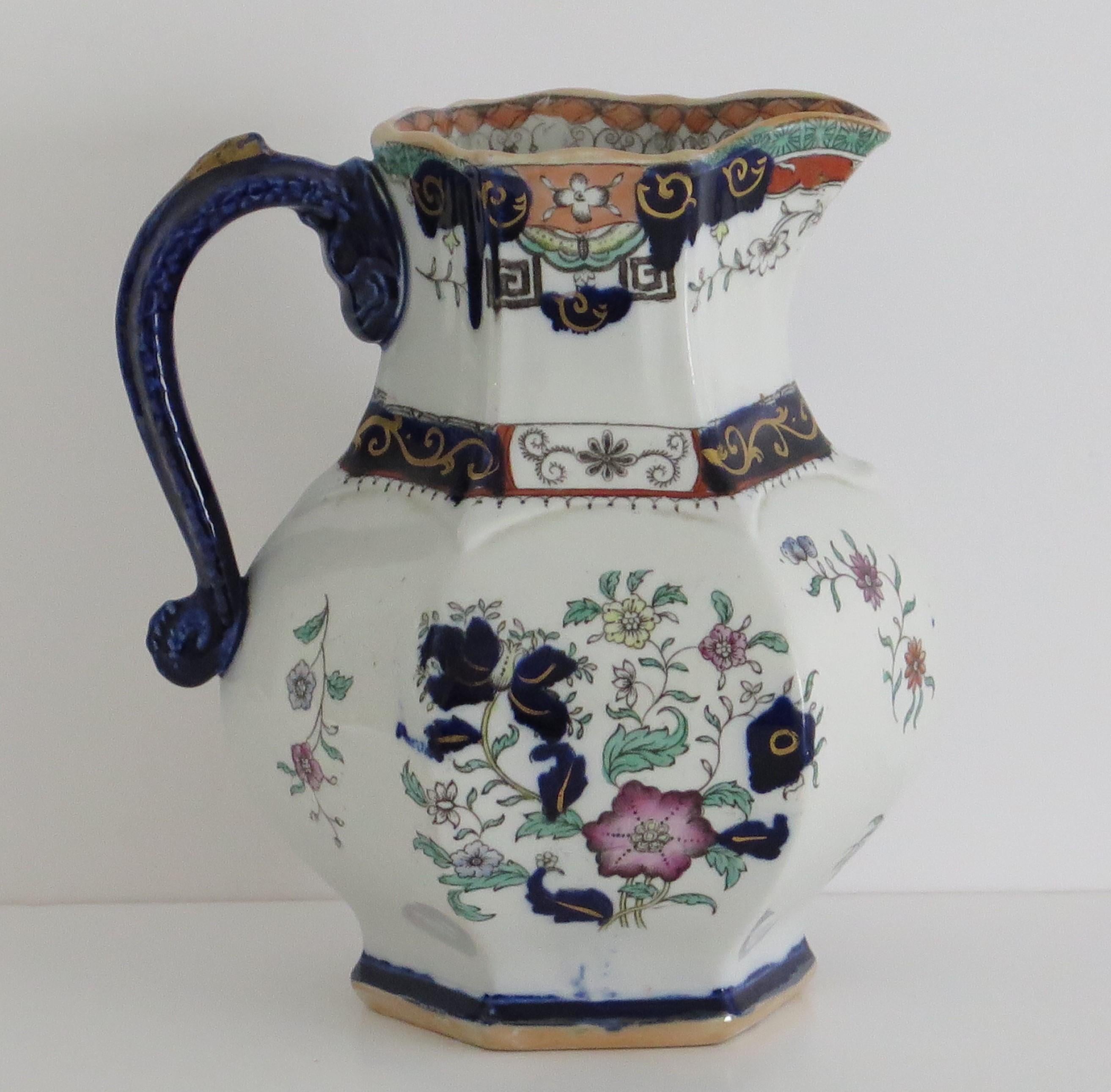 This is a very decorative fairly large & well hand painted, Jug or Pitcher made by Mason's Ironstone pottery, circa 1830.

It has a rare shape and pattern.

A jug of the same shape and pattern is illustrated on Page 192, Plate 245 of Godden's