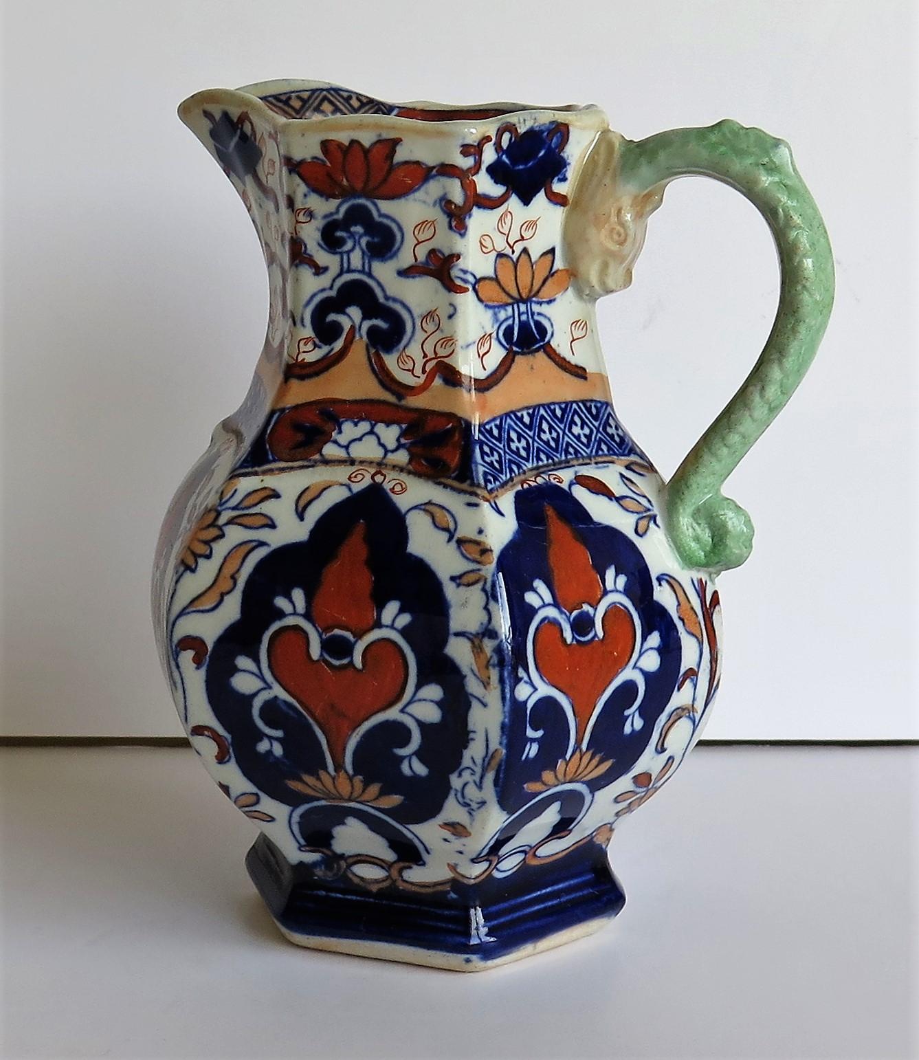 This is a very decorative, well hand painted, Jug or Pitcher made by Mason's ironstone pottery, circa 1830.

It has a rare shape and pattern.

A jug of the same shape and pattern is illustrated on Page 192, Plate 245 of Godden's guide to Mason's
