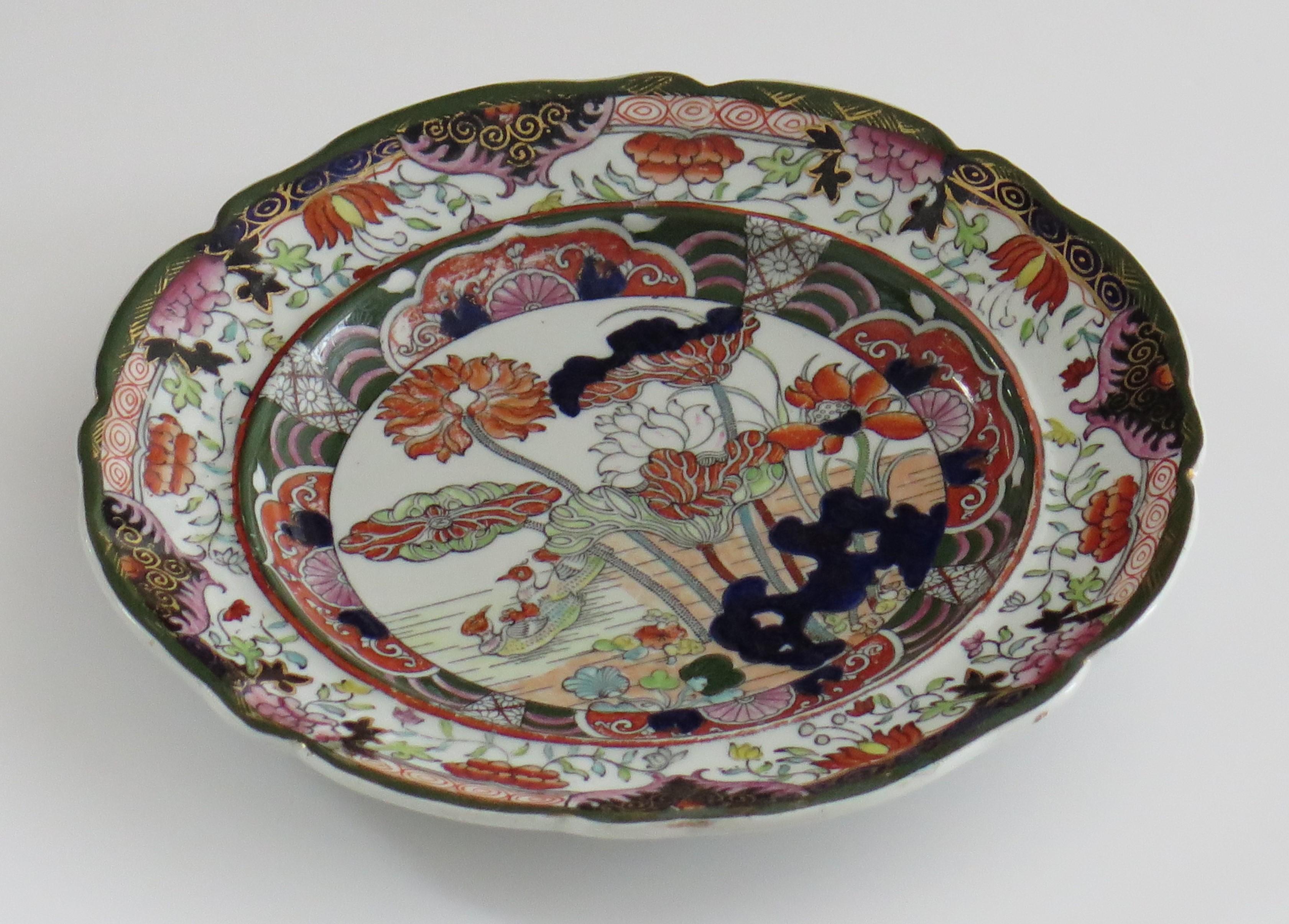 This is a beautifully hand painted Desert Plate in the rare Muscove Duck pattern by Mason's Ironstone, Lane Delph, England, dating to circa 1825.

The piece is well potted with a slightly ribbed side edge and moulded wavy rim.

The pattern is