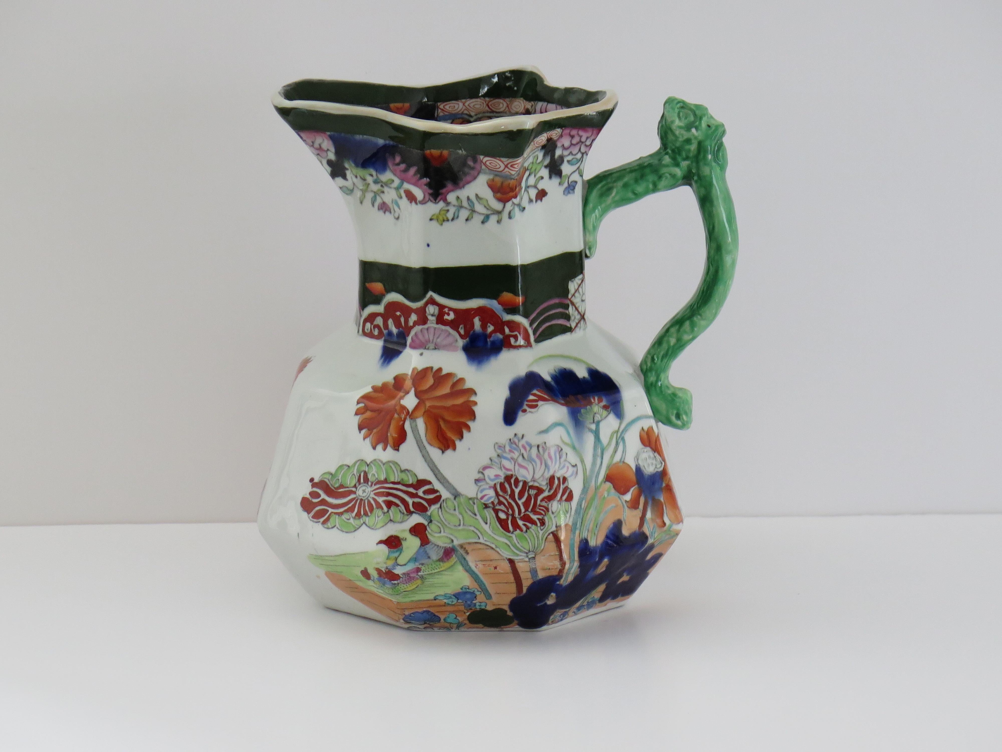 This is a beautifully hand painted Large Jug or Pitcher in the rare Muscove Duck pattern, made by Mason's Ironstone, Lane Delph, England, dating to circa 1825.

This is a one of Mason's larger Jugs at 8.5 inches high. It is well potted and heavy