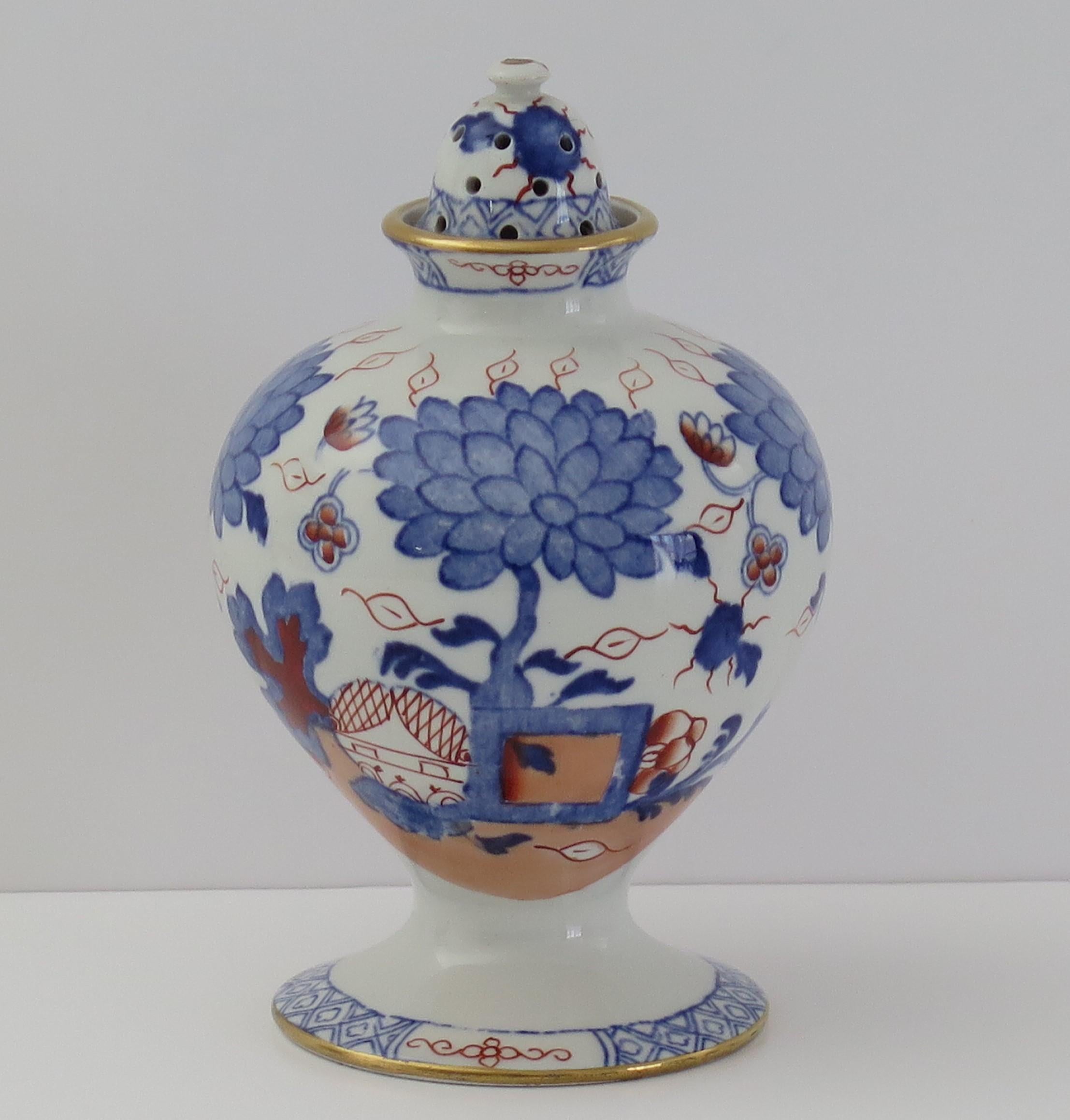 This is a rare Pot-Pourri Vase and Cover, hand painted in the Jardiniere pattern, made by Mason's Ironstone, Lane Delph, England and dating to circa 1890.

This is a rare piece potted as a globular vase with a narrow neck, raised on a low foot and