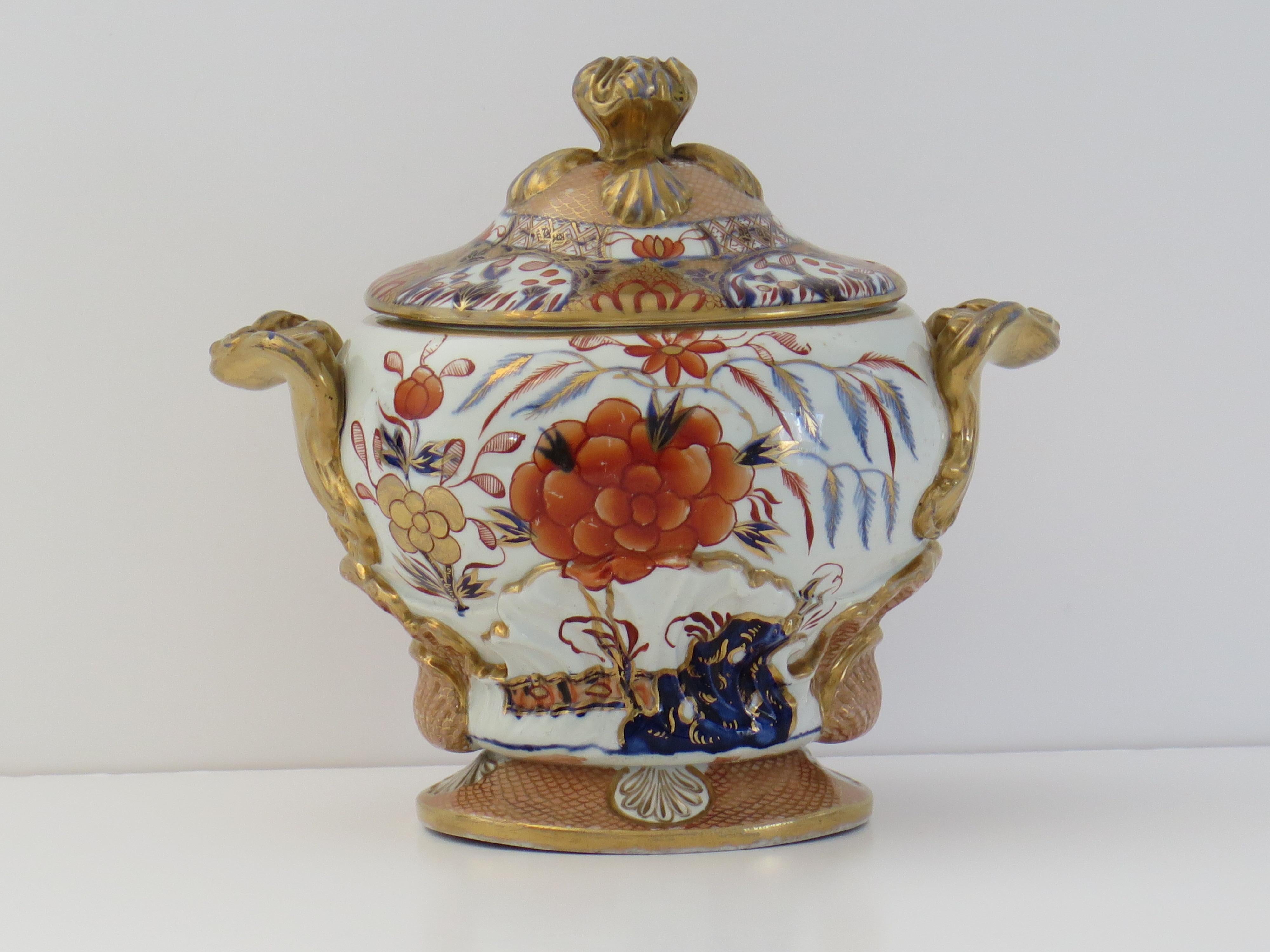 This is a stunning Sauce Tureen by Mason's Ironstone, Lane Delph, England in the rare Fence, Rock & Blue Willow hand painted gilded pattern, dating to the very early period of Mason's ironstone, circa 1818.

This is a rare shaped Tureen

Both