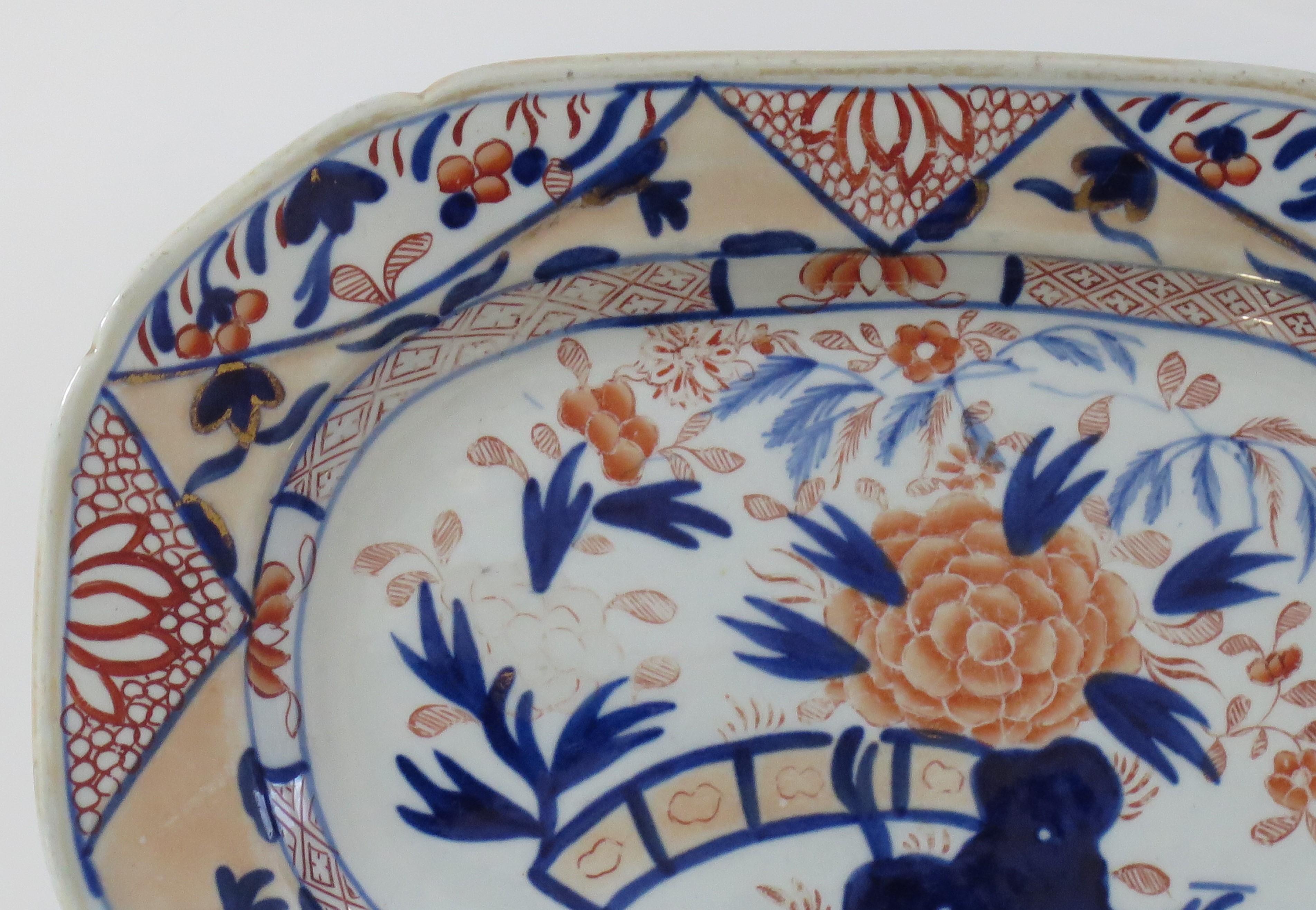 This is a very decorative small rectangular serving platter by Mason's Ironstone, Lane Delph, England in the Oriental Pheasant pattern, dating to the very early period of Mason's ironstone, circa 1820.

The platter or dish is rectangular in shape