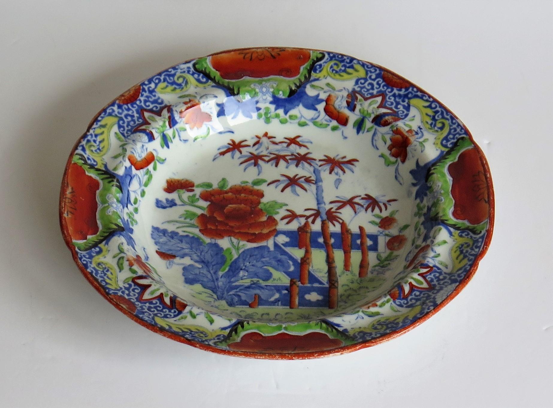 This is an early 19th century Ironstone soup bowl produced by Mason's Ironstone in a distinctive Chinoiserie pattern, fully marked and dating to circa 1825.

This soup bowl or deep plate is decorated in a striking chinoiserie pattern comprising a