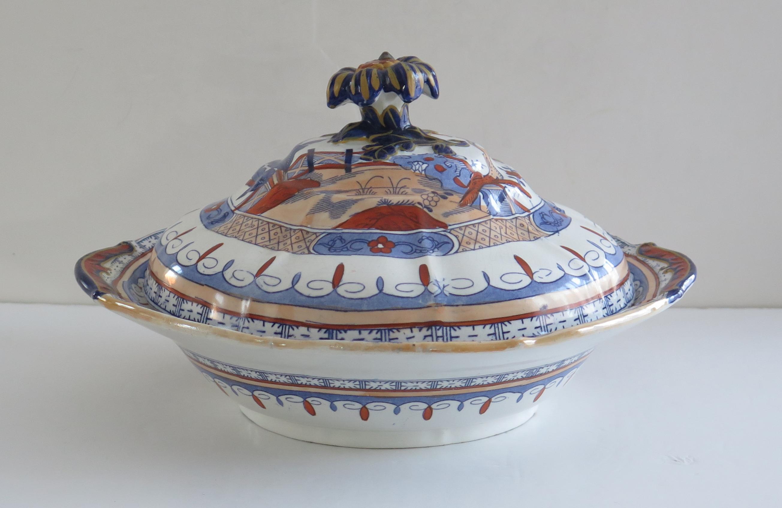 This is an Ironstone Tureen, complete with lid, made by Mason's of Lane Delph, Staffordshire, England, during the early part of the 19th century, circa 1825 to 1840.

This is a rare shape piece in a rare pattern.

This tureen and its lid are