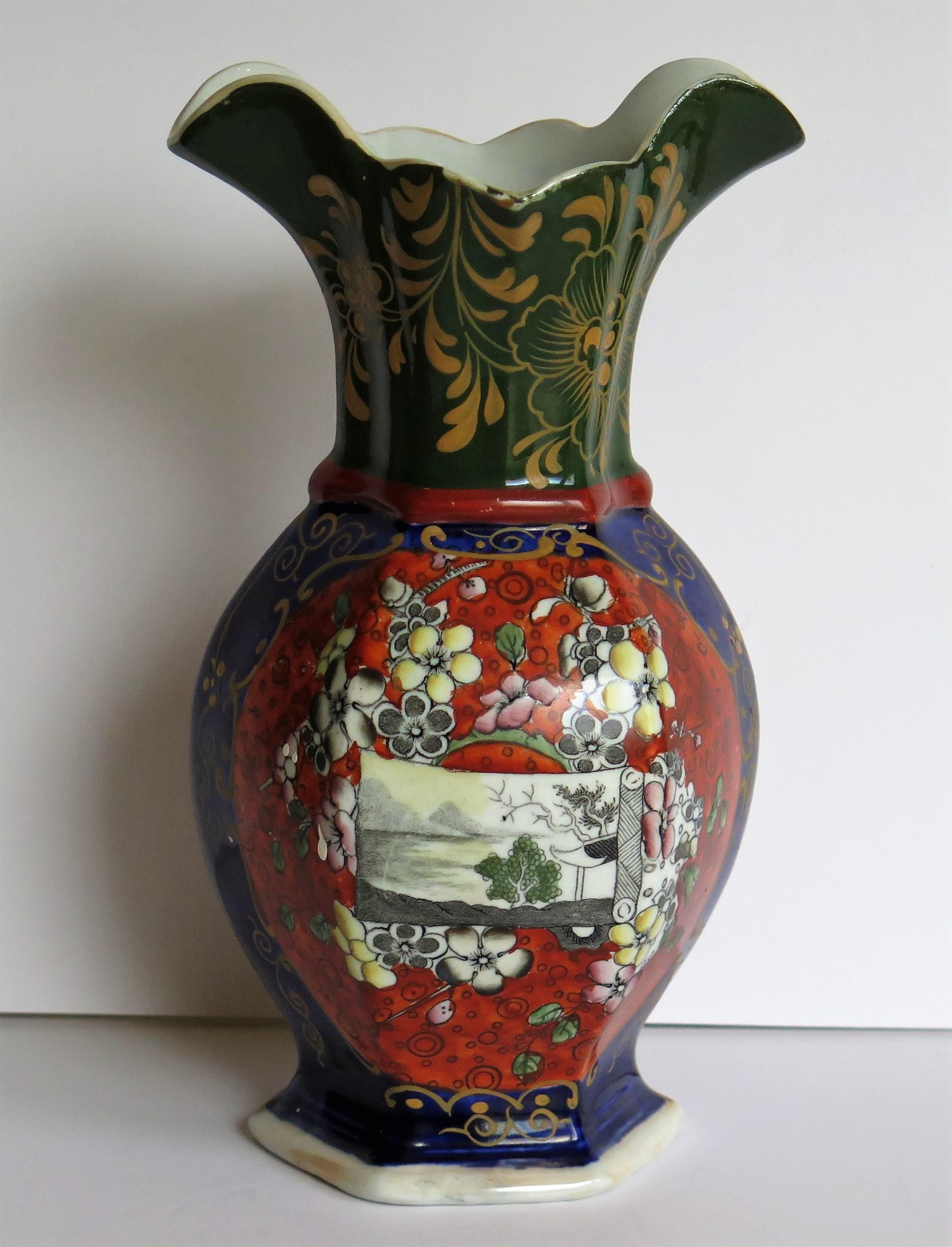 This is a good baluster vase made by Mason's ironstone, Lane Delph, England in the first half of the 19th century, circa 1830.

The vase is well potted of hexagonal baluster form with a shaped wavy rim. This is a fairly rare shape.

The pattern