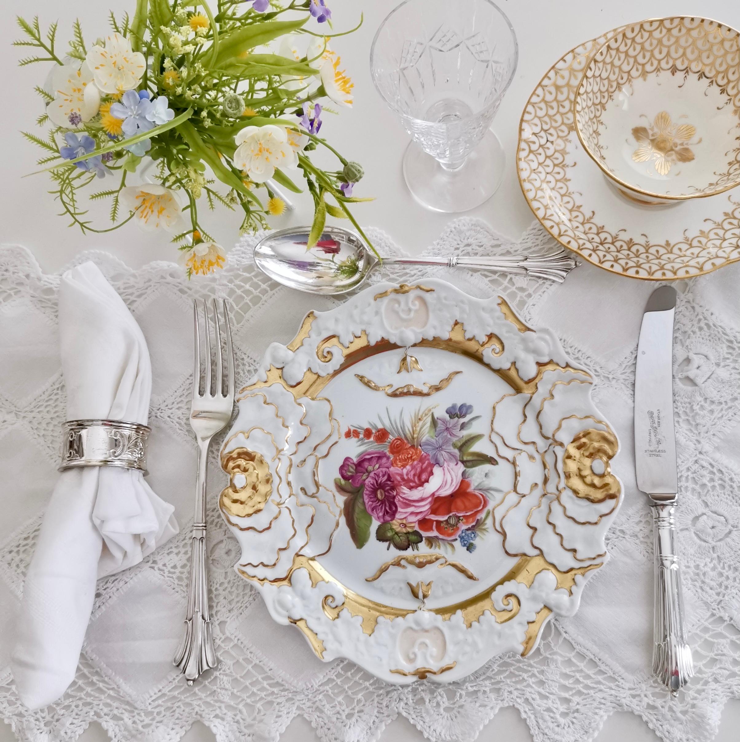 This is a beautiful dessert plate made by Miles Mason between 1815 and 1820. 
 
Miles Mason was one of the early ones of the second wave of British porcelain makers, alongside Spode and others. Mason was a prominent porcelain retailer in London at