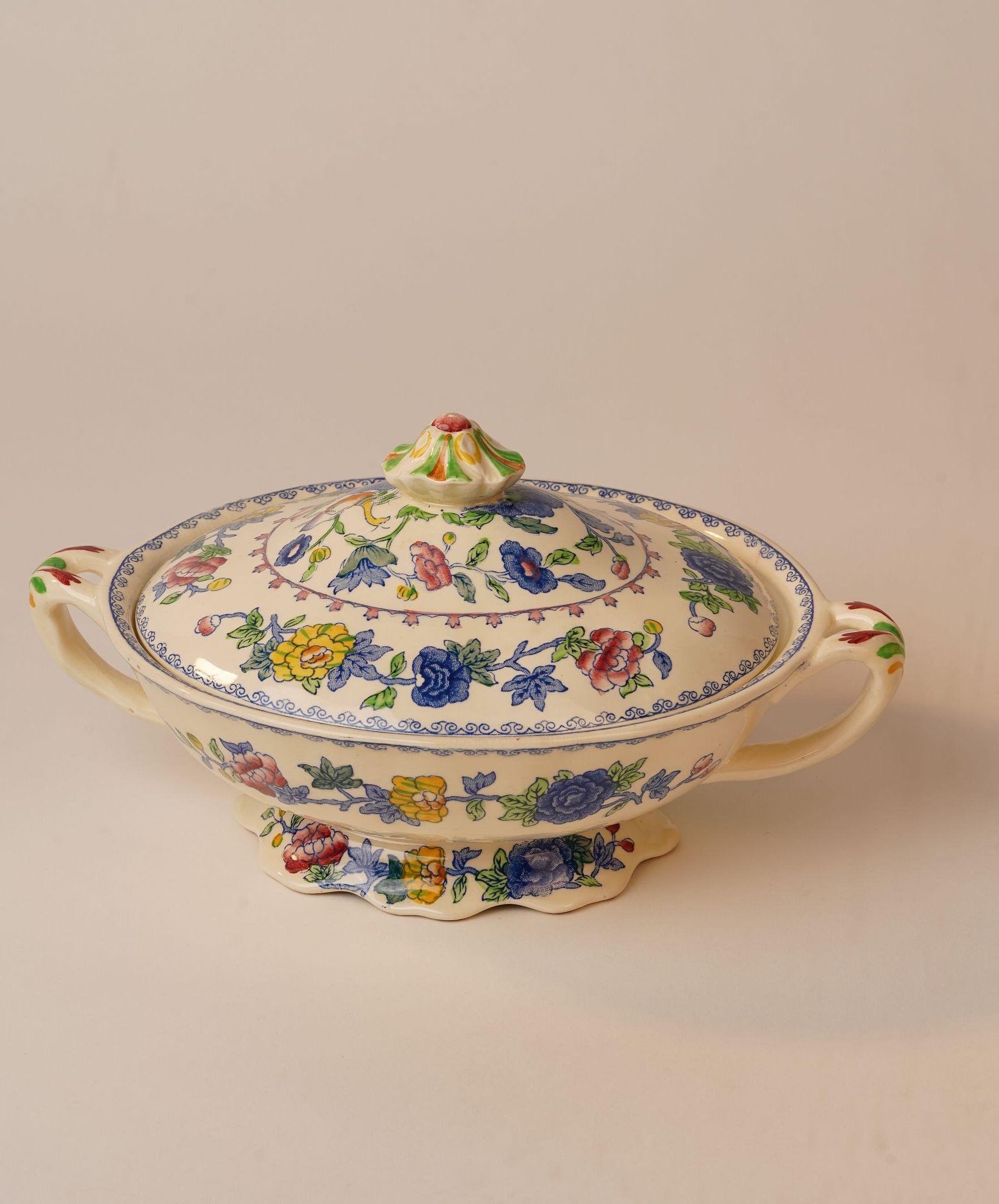 This exquisite 23-piece dinner set by Mason’s Ironstone belongs to the iconic Regency pattern—a celebrated example of 19th-century English transferware. What sets this set apart is its completeness and condition: six dinner plates, six side plates,