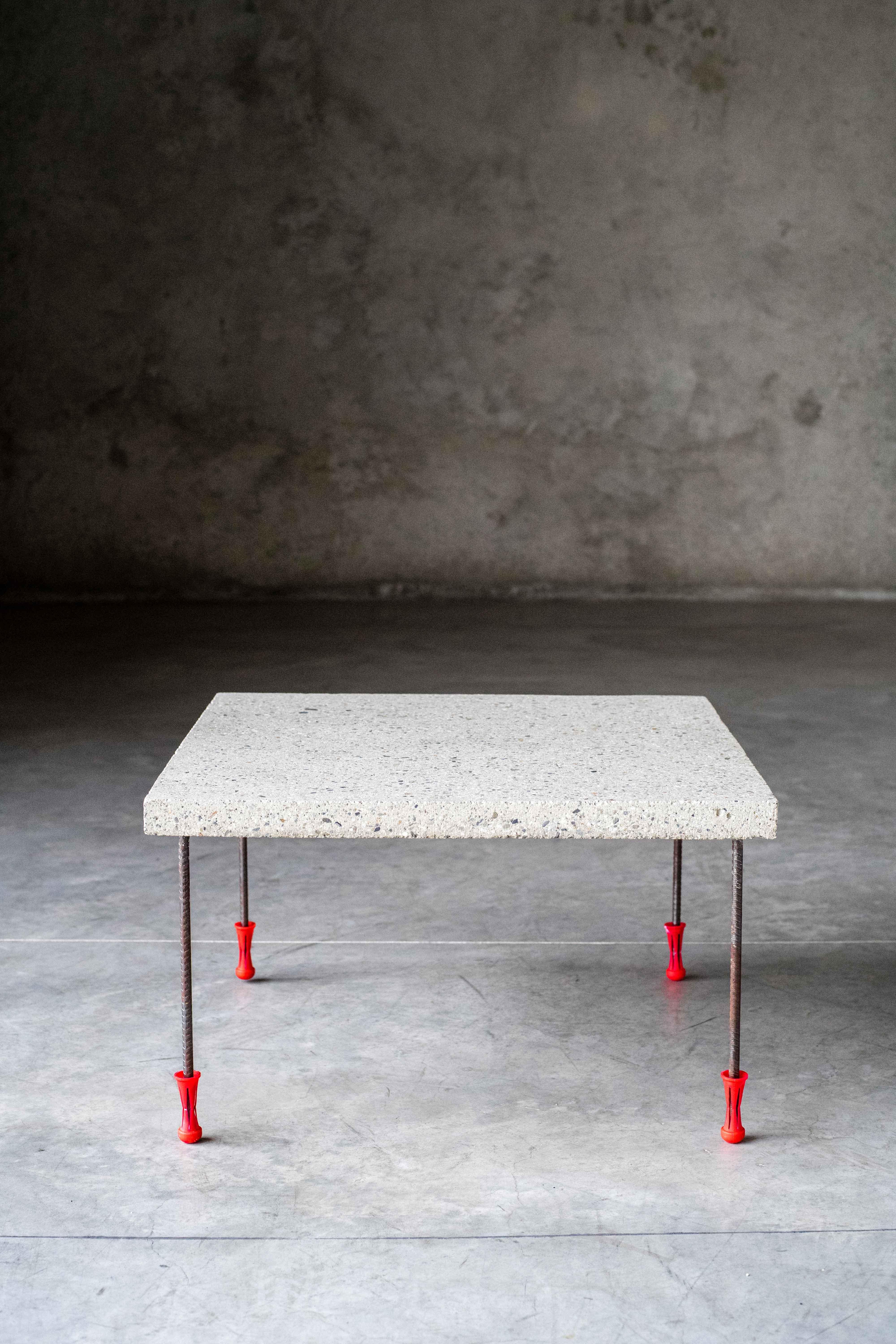 Mason's table by MOB 
Limited editions of 5 + 1 prototype
Designer: BAST (France)
Dimensions: H 75 x D 60 x W 60 cm
Material: concrete

The mason’s table is conceived to be built by any mason. It uses basic construction materials that can be