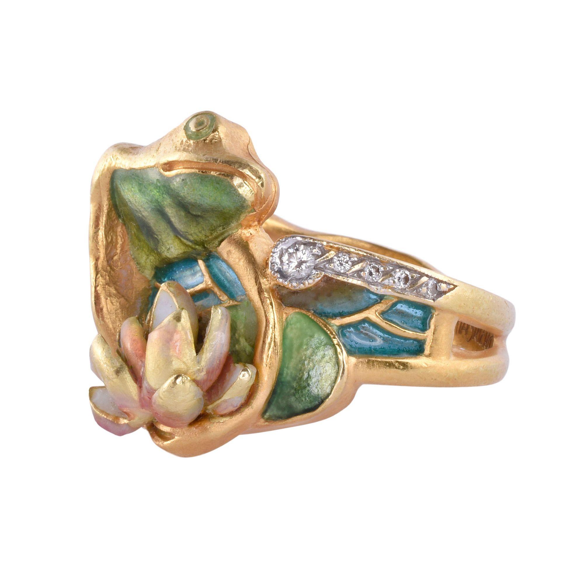 Estate Masriera 18K enamel frog & water lily ring, circa 1980. This 18 karat yellow gold ring signed by Masriera features a frog and water lily design with full cut diamond accents at .08 carat total weight. The diamonds have VS1 clarity and F-G