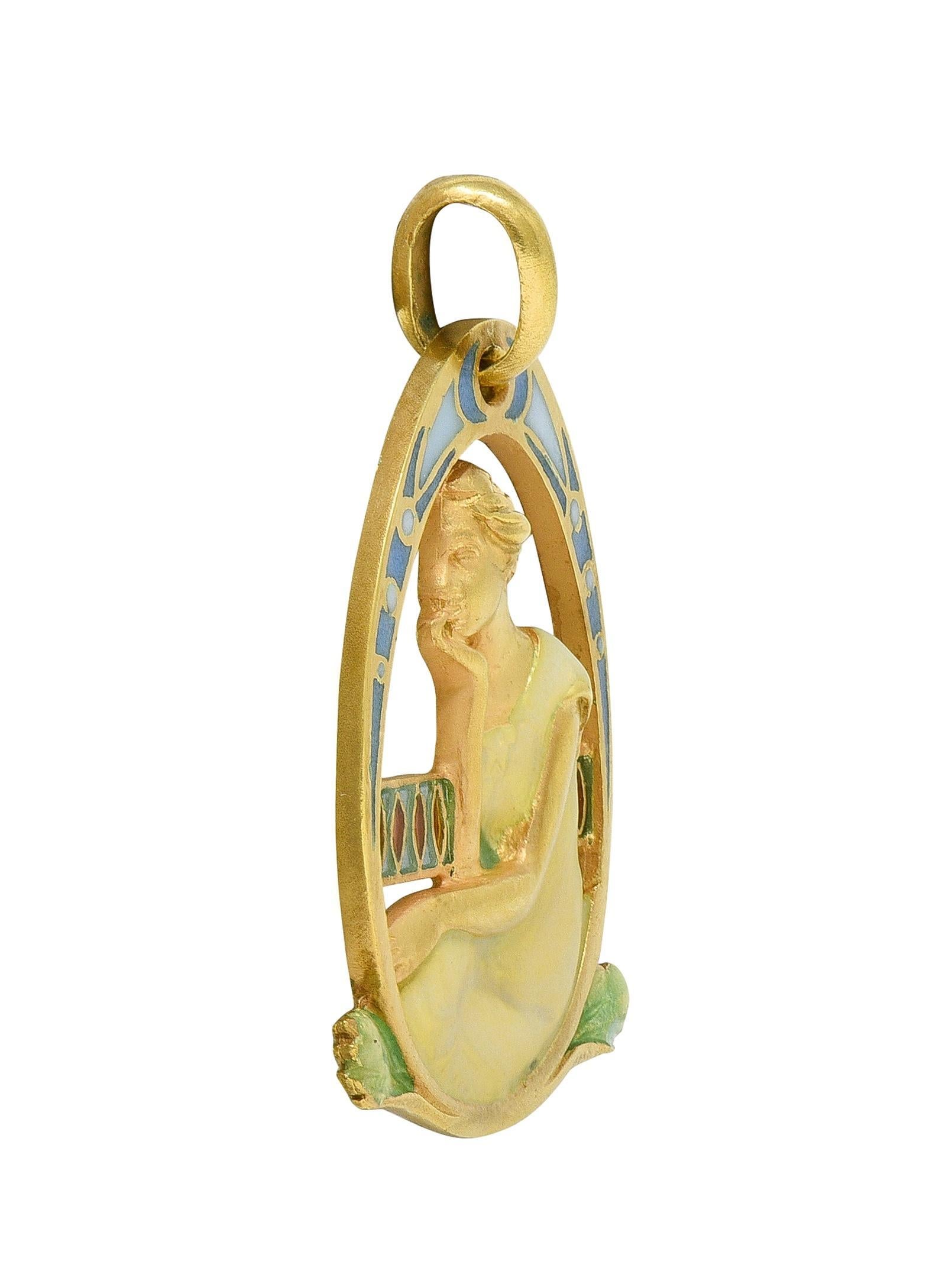 Designed as pierced oval form depicting a woman seated in the grass with arching surround
Woman is yellow gold with textured hair and wearing a gown glossed with enamel
Opaque white topped with transparent iridescent pink/yellow - minimal loss
Arch