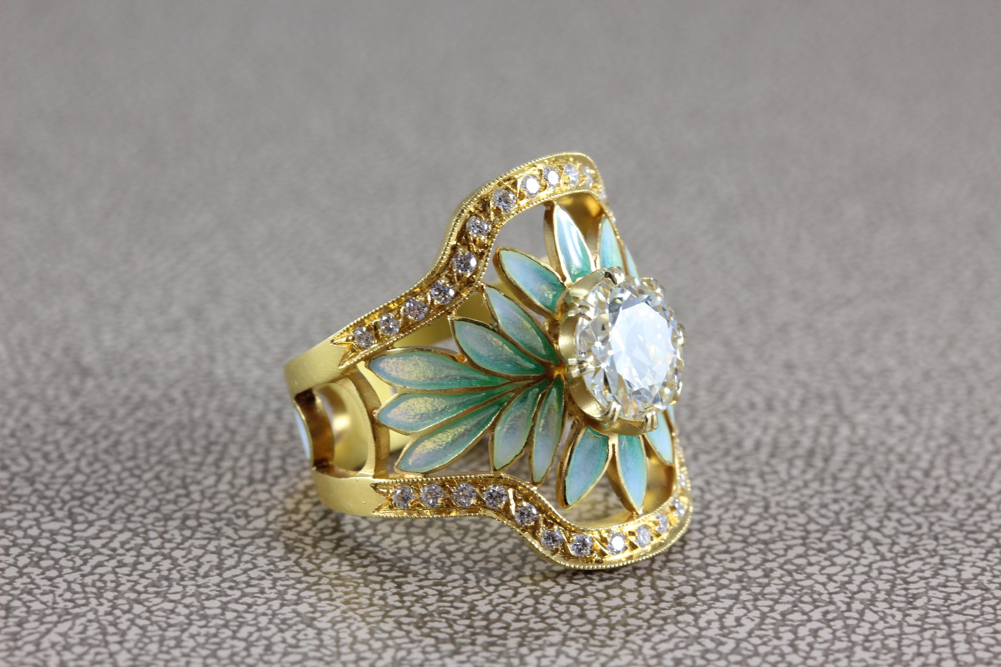 A special ring by the Spanish Barcelona based house of Masriera famous for their Art Nouveau style work and Plique-a-Jour enamel, as seen in fine examples in this fabulous piece. The ring mains a 1.80 carat round cut diamond with VS clarity.