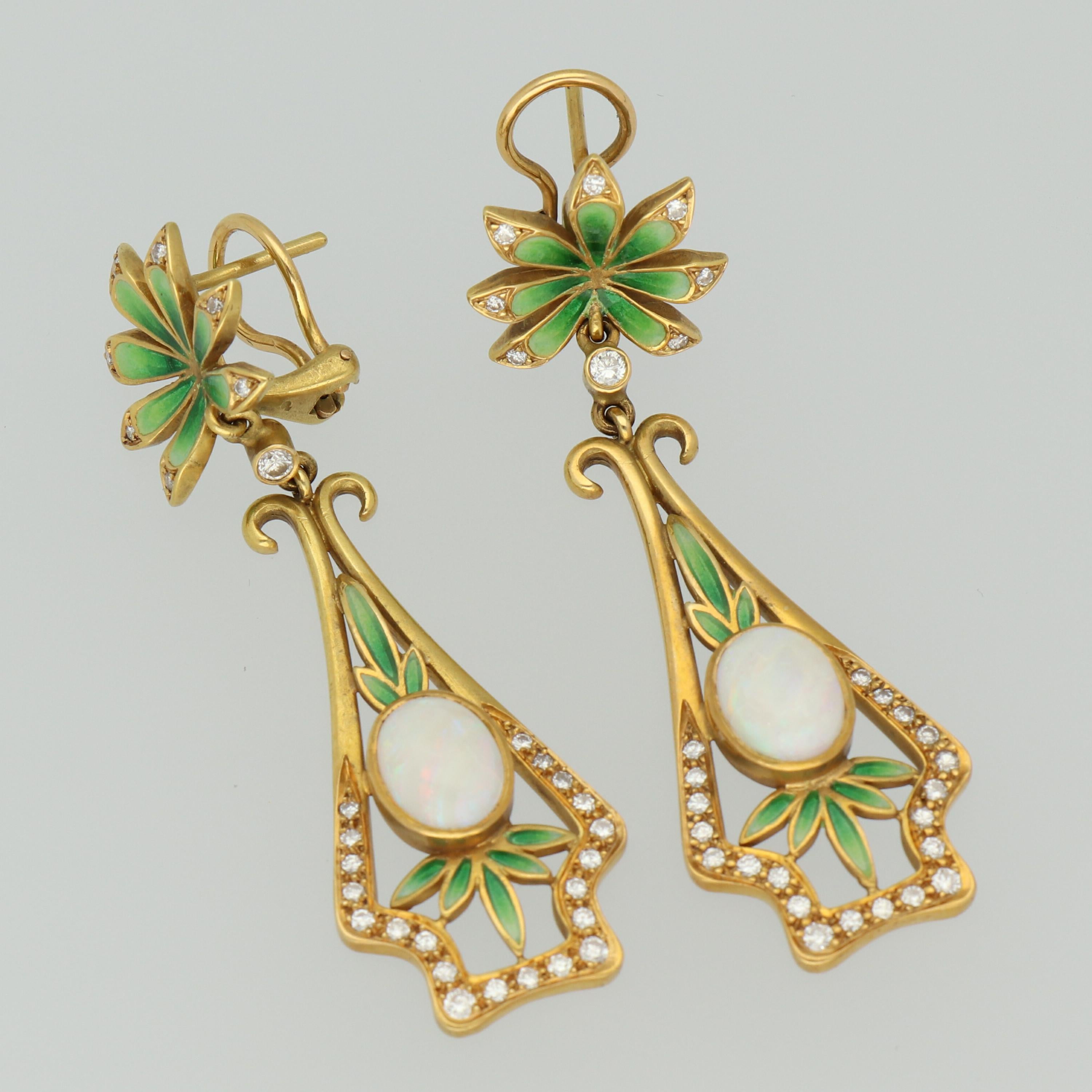 A naturalistic Modernist Masriera 18K matte yellow gold drop earrings, with two cabochon-cut opals, weighing 4.00 carat, and 58 brilliant-cut diamonds, approximately weighing 1.16 carats, and pliquè-a-jour fine enamel.

Components:
2 Opals
Diamonds