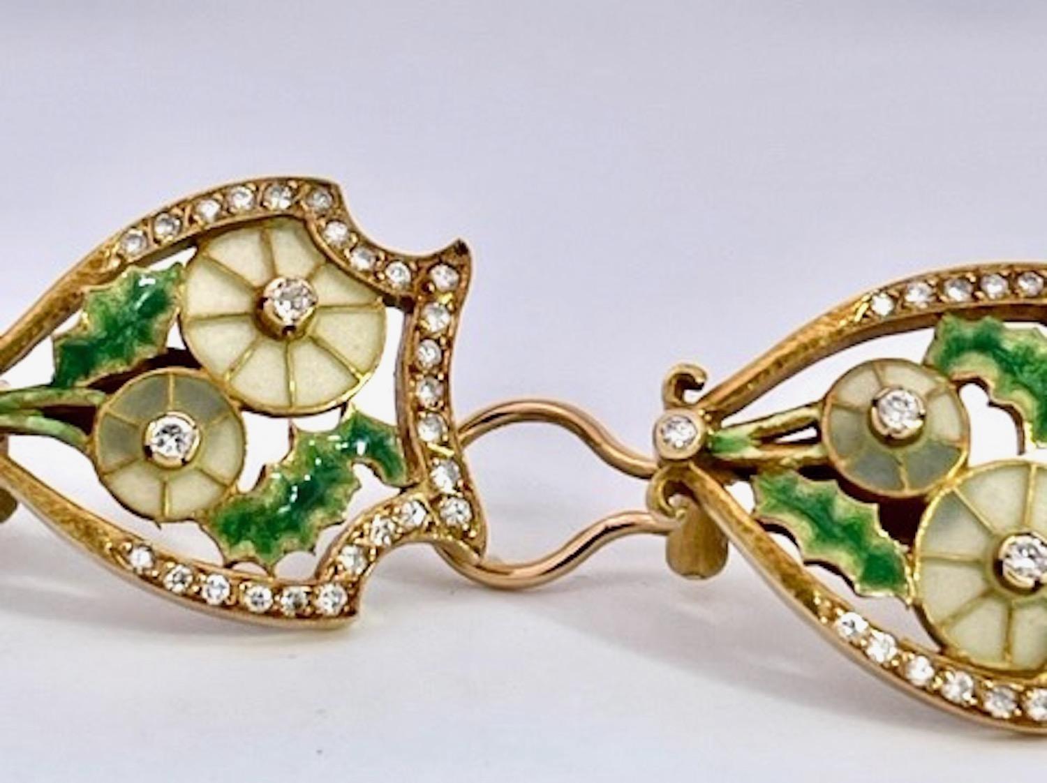 These earrings are special and match most of my other Masriera pieces.    They are designed as a shield with Diamonds surrounding the frame.  There are 26 Diamonds plus one on the bottom of each earring and two (2) Diamonds in the center of the