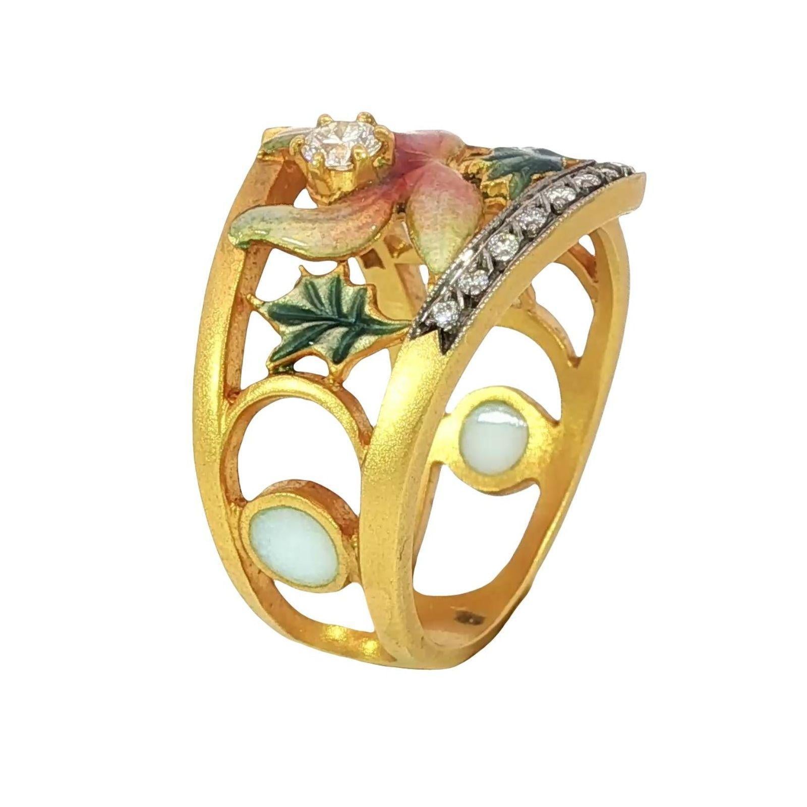 Masriera Plique-a-Jour Enamel Diamond 18K Yellow Gold Leaf Motif Ring Size 7

This 18k yellow gold ring by Masriera features a detailed floral design, centered on a 0.33-carat round white diamond. The diamond is framed by delicate petals rendered in