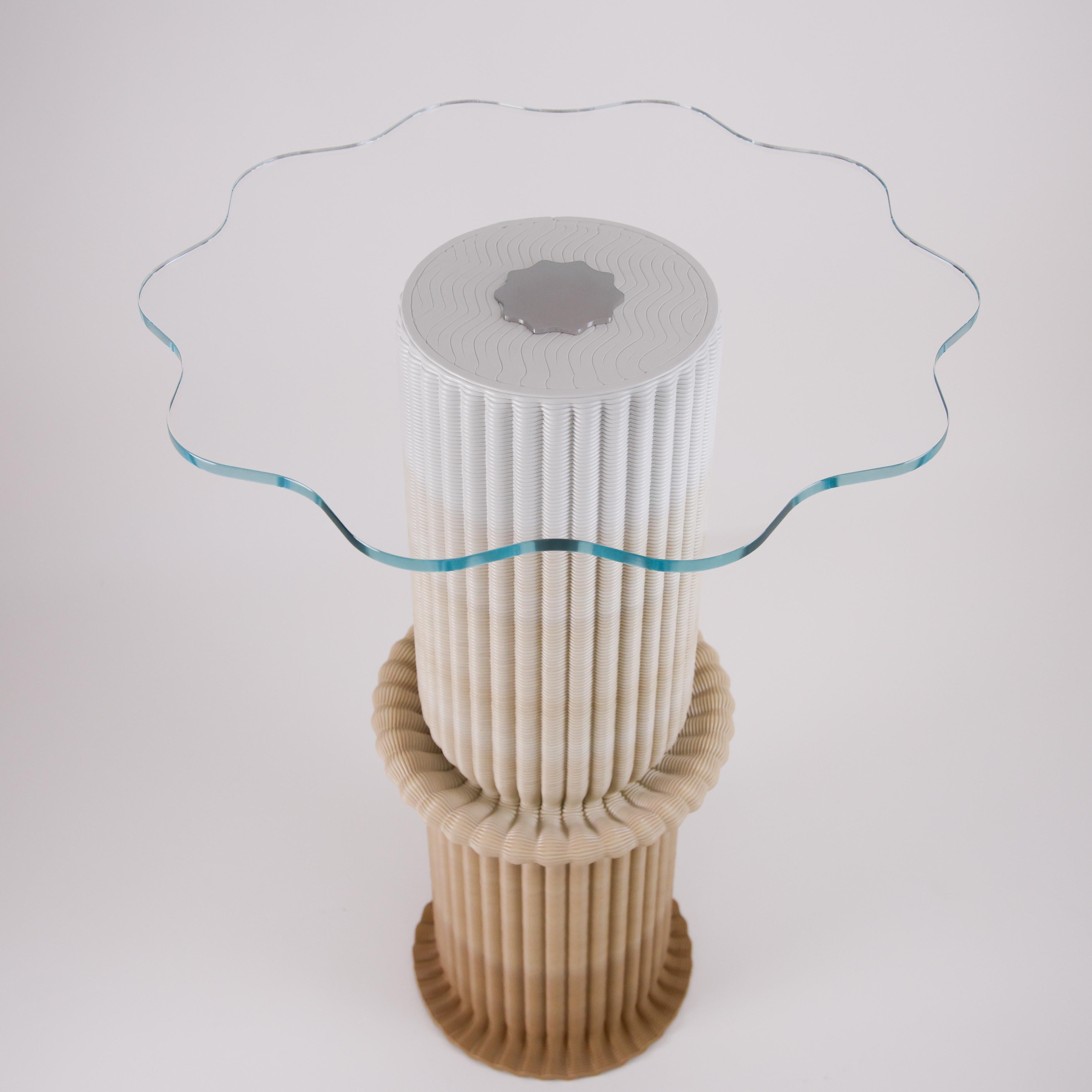 Sculptural Bar / Bistro Table 3D-Printed with High-Strength Recycled Plastic, two-tone gradient finish. After the 3D printing process, the base is fire heated and shaped by hand. Tempered glass on top with stainless steel detail.

The Massage bar