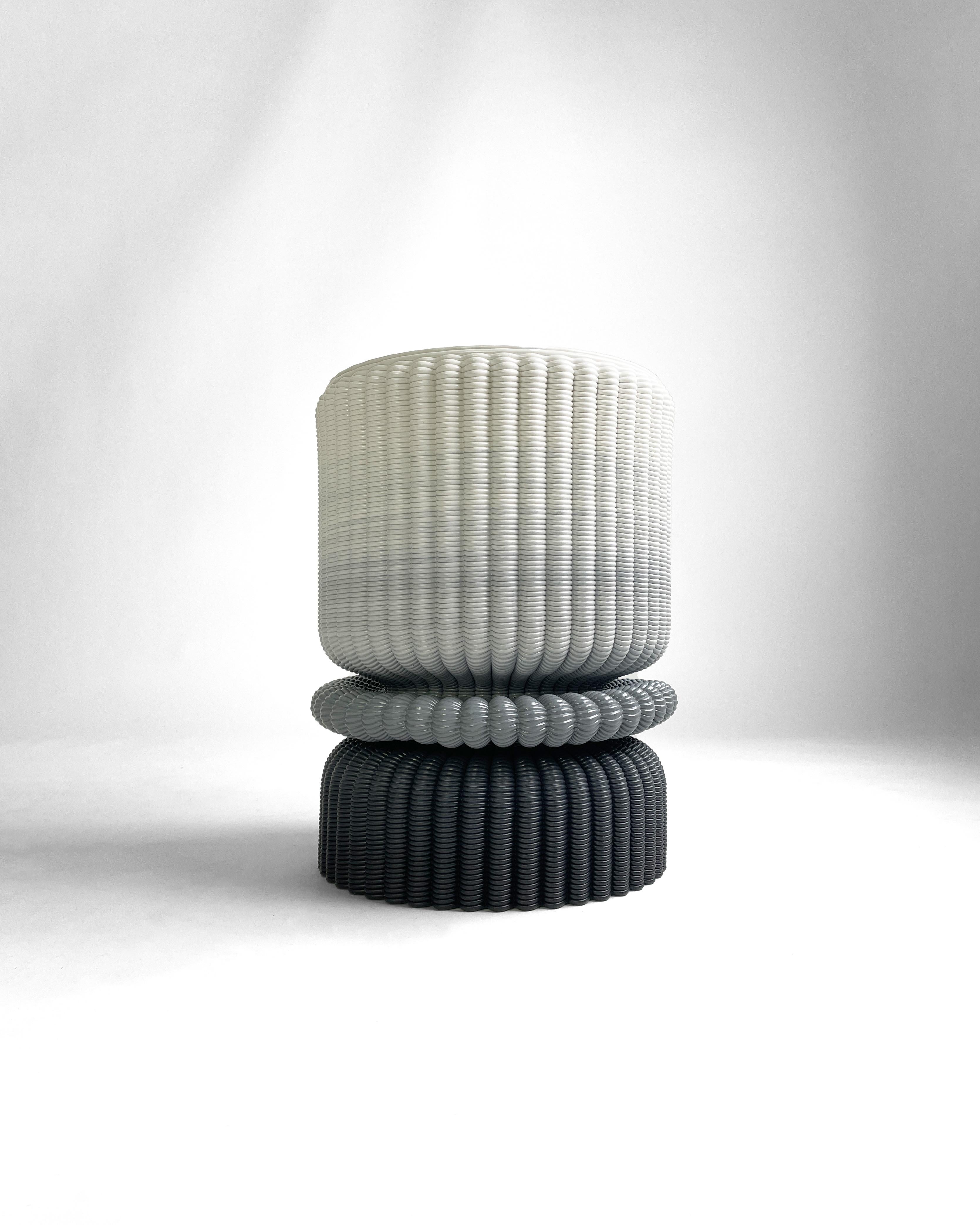 Sculptural Stool 3D-Printed with High-Strength Recycled Plastic and shaped by hand. Two-tone gradient finish. Winner of the Elle Decor Design Award Brazil 2024 in the 