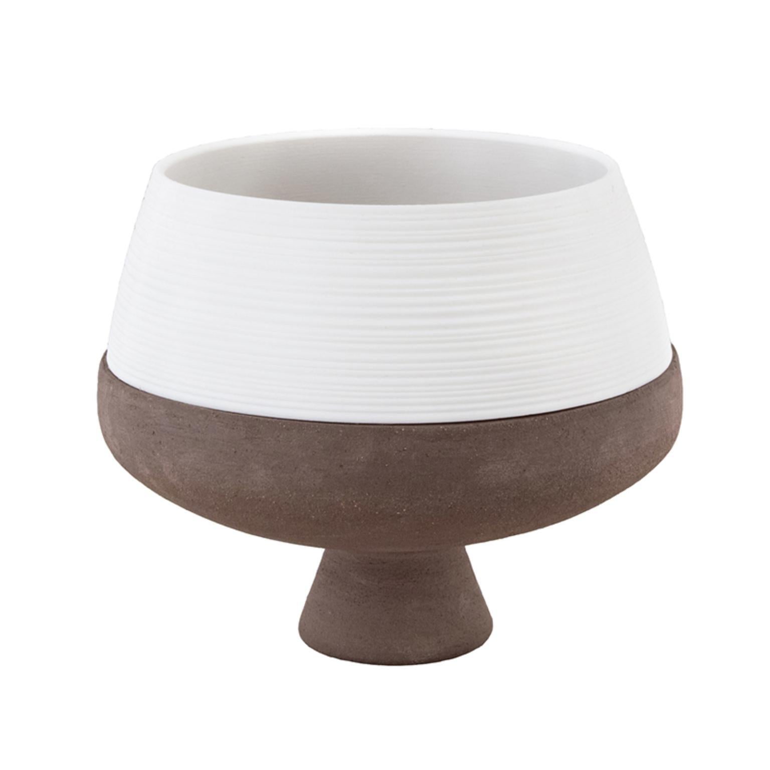 Massawa Vase by ZPS Studio
Dimensions: D 24.8 x H 13.8 cm
Materials: Grey Terracotta, raw; white syntherized nylon, matt.

A number of 31 bowls of identical shape, made in limited edition by fine Italian artisans in 31 different materials: Diogenèa