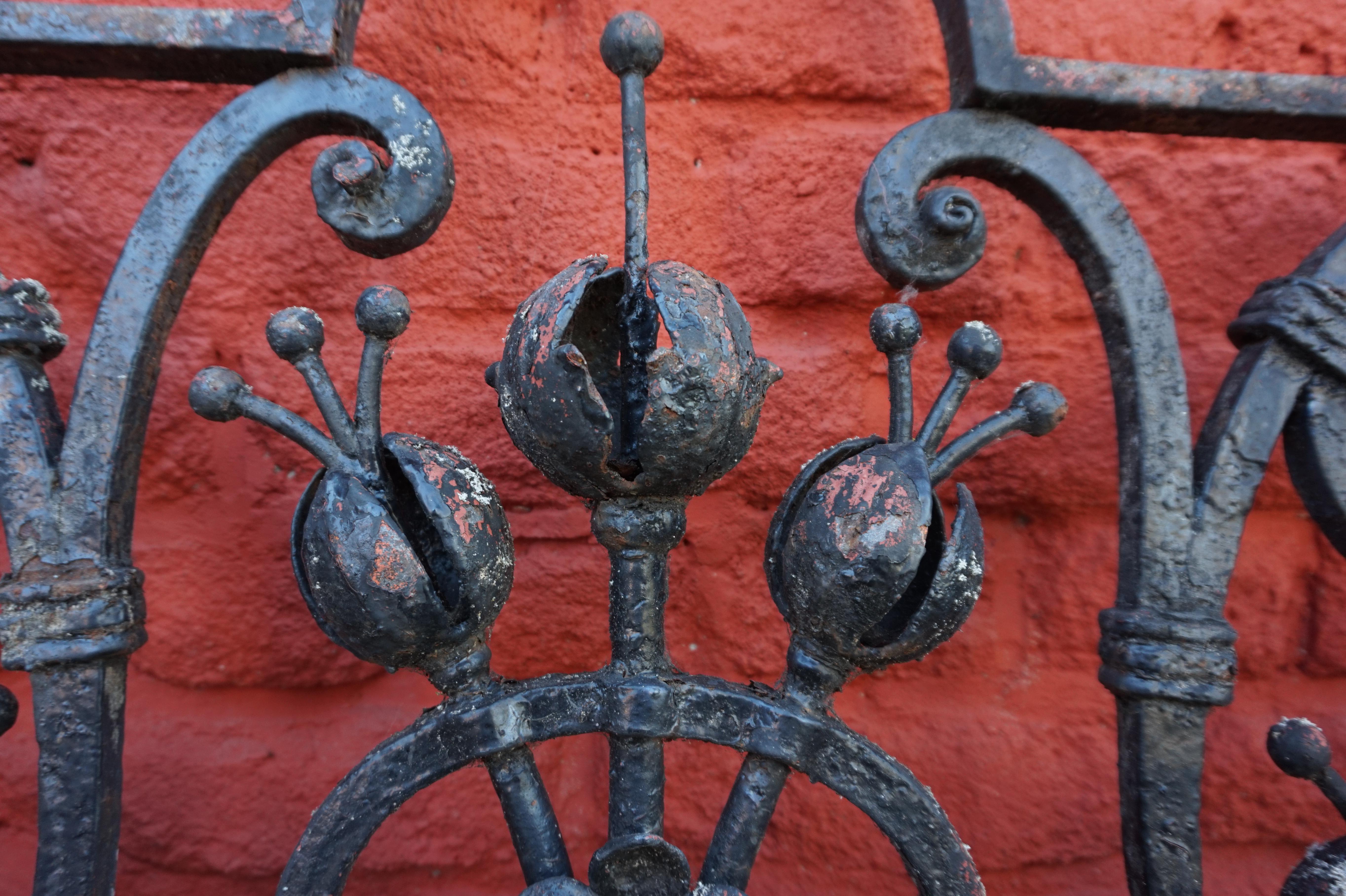 Beautiful ironmongery garden gate, overloaded with flowers, leaves and other elements. Gate from an old manor house, very solid and heavy. Sound condition. Several layers of paint on it. Must be restored.