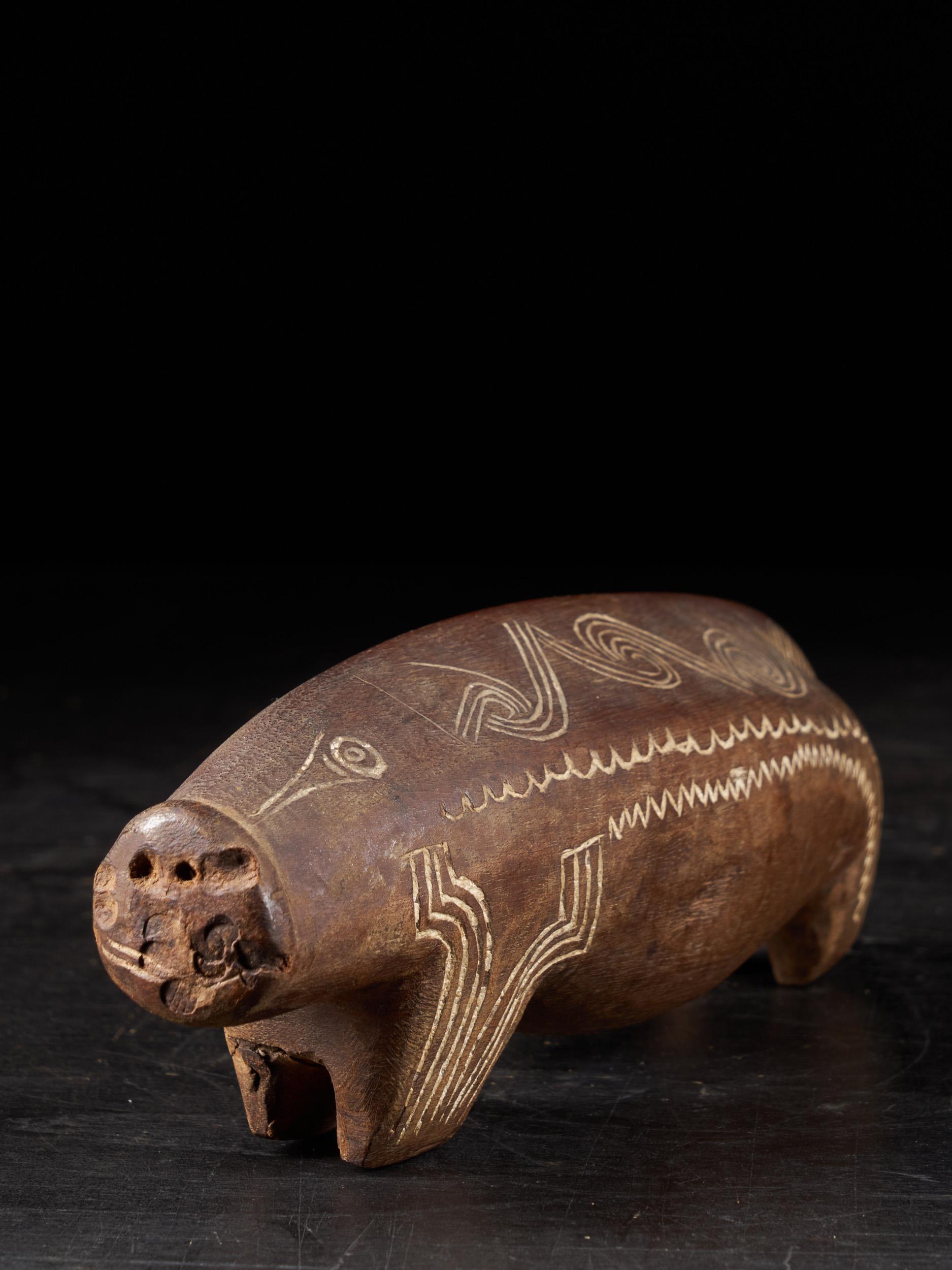 Papua New Guinean Ethno Design Massim People, Trobiand Islands, Wooden Charm Pig Sculpture For Sale