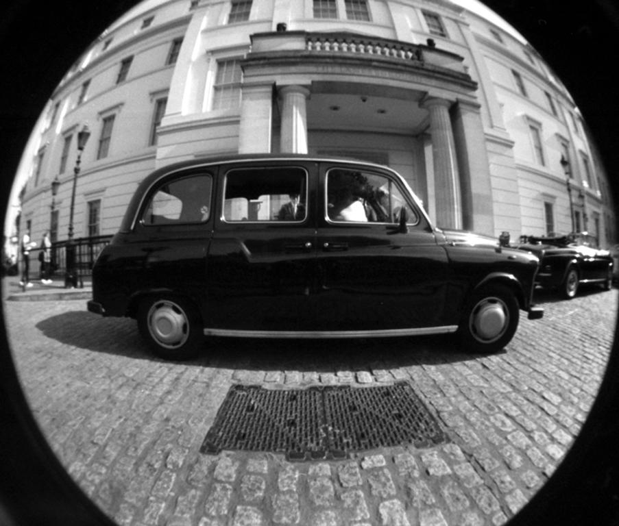 Black Cab- Massimiliano Muner B&W Fish Eye Lens Photo For Sale 1