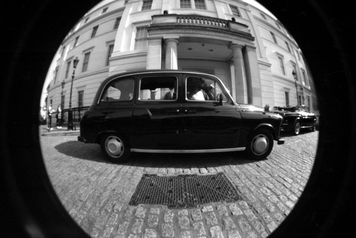 This photo is a black and white print made by Massimiliano Muner with a fish-eye lens..


He was born in Trieste. In 2011, he is awarded for the creative technique of cutting polaroid images into a collective of over 40 photographers, winning the