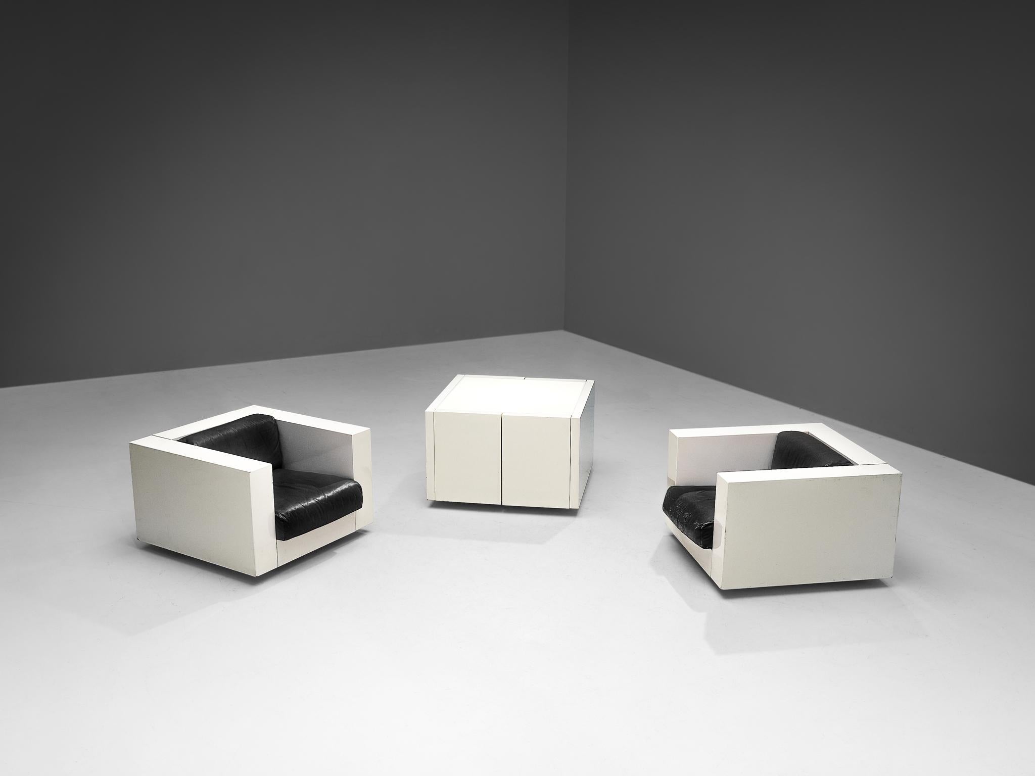 Massimo and Lella Vignelli for Poltronova, set of 'Saratoga' lounge chairs and coffee table/cabinet, polyester lacquer, leather, Italy, 1964 

This set of two lounge chairs and a table is introduced as 'Saratoga'. The combination of the two pieces