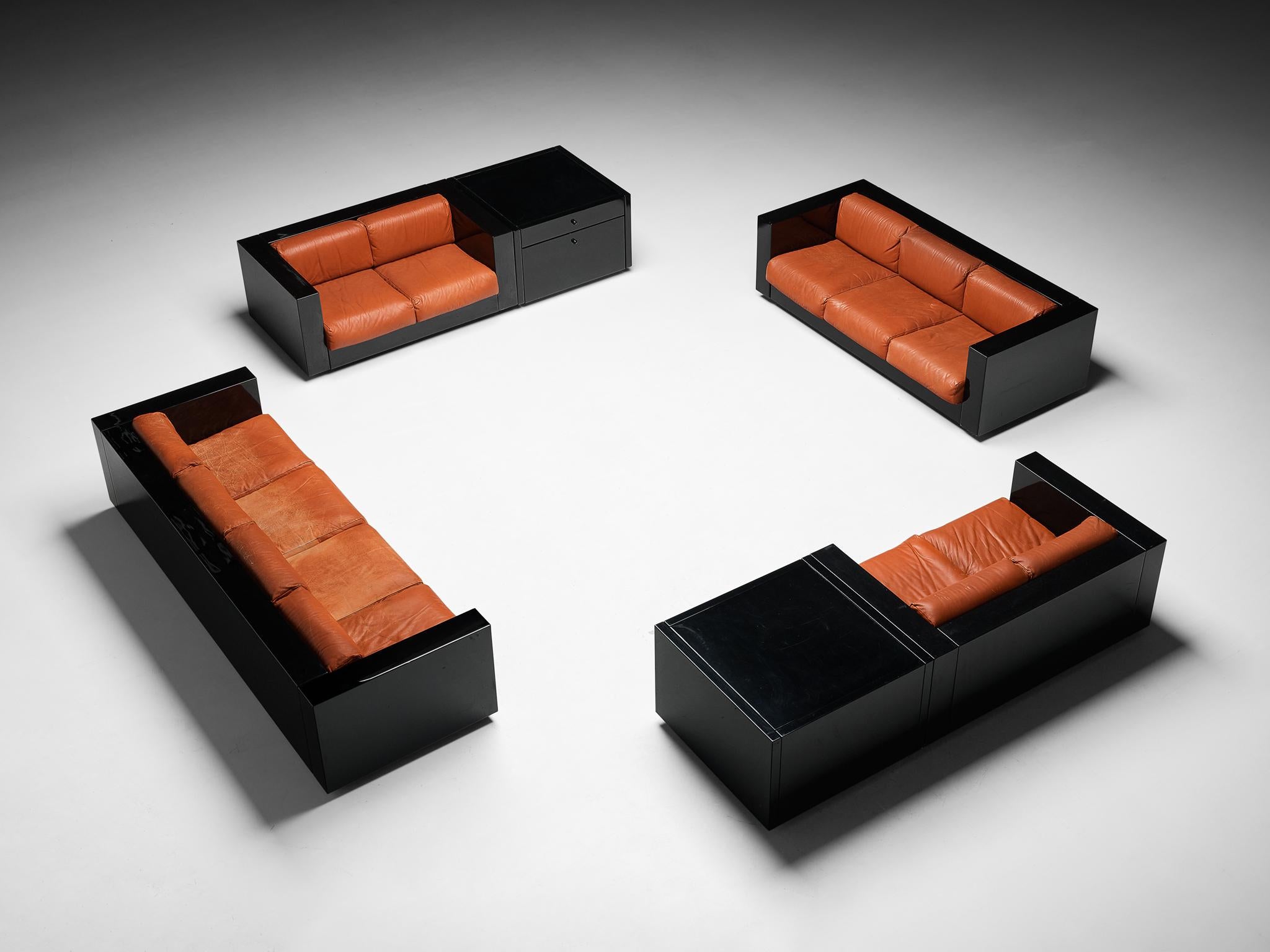 Massimo and Lella Vignelli for Poltronova 'Saratoga' living room set, four-seat sofa, three-seat sofa, two two-seat sofas, cabinets, polyester lacquer and red leather, Italy, 1964.

Captivating large lounge set or living room interior by Italian