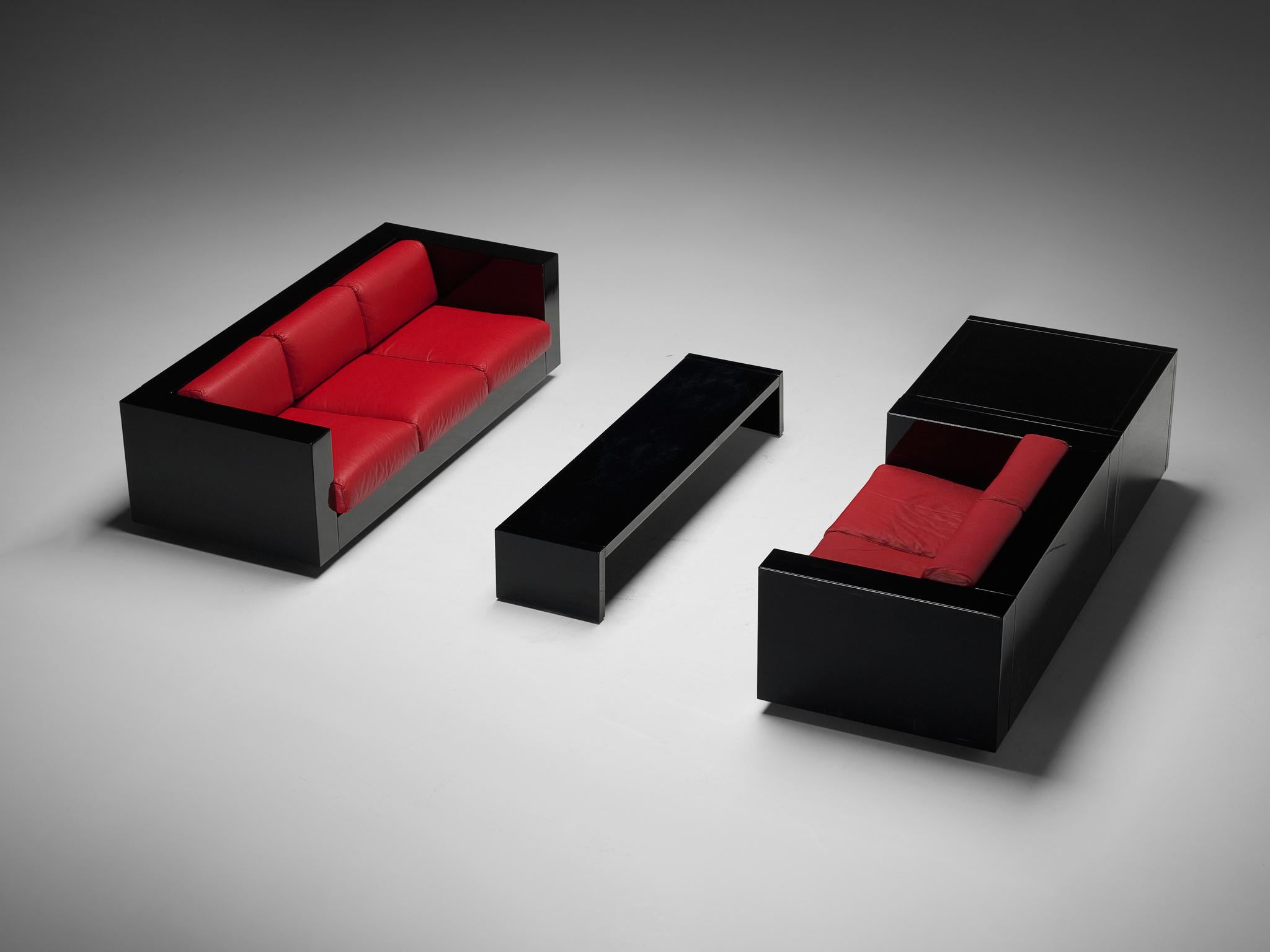 Massimo and Lella Vignelli for Poltronova 'Saratoga' living room set three-seat sofa, two-seat sofa, coffee table, and cabinet, polyester lacquer and red leather, Italy, 1964.

Captivating large lounge set or living room interior by Italian designer