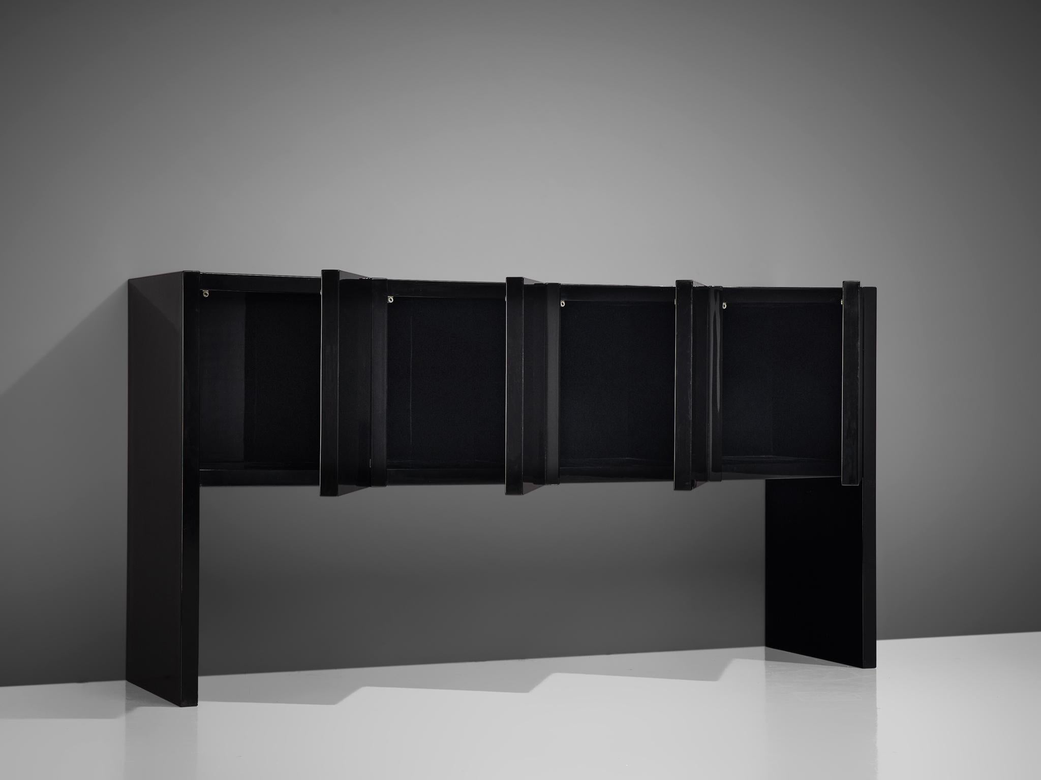 Massimo and Lella Vignelli for Poltronova, Saratoga sideboard, black lacquered wood, Italy, 1964. 

This sideboard is part of the 'Sartoga' livingroom collection, designed by Italian designer couple Lella & Massimo Vignelli. The Vignelli's were
