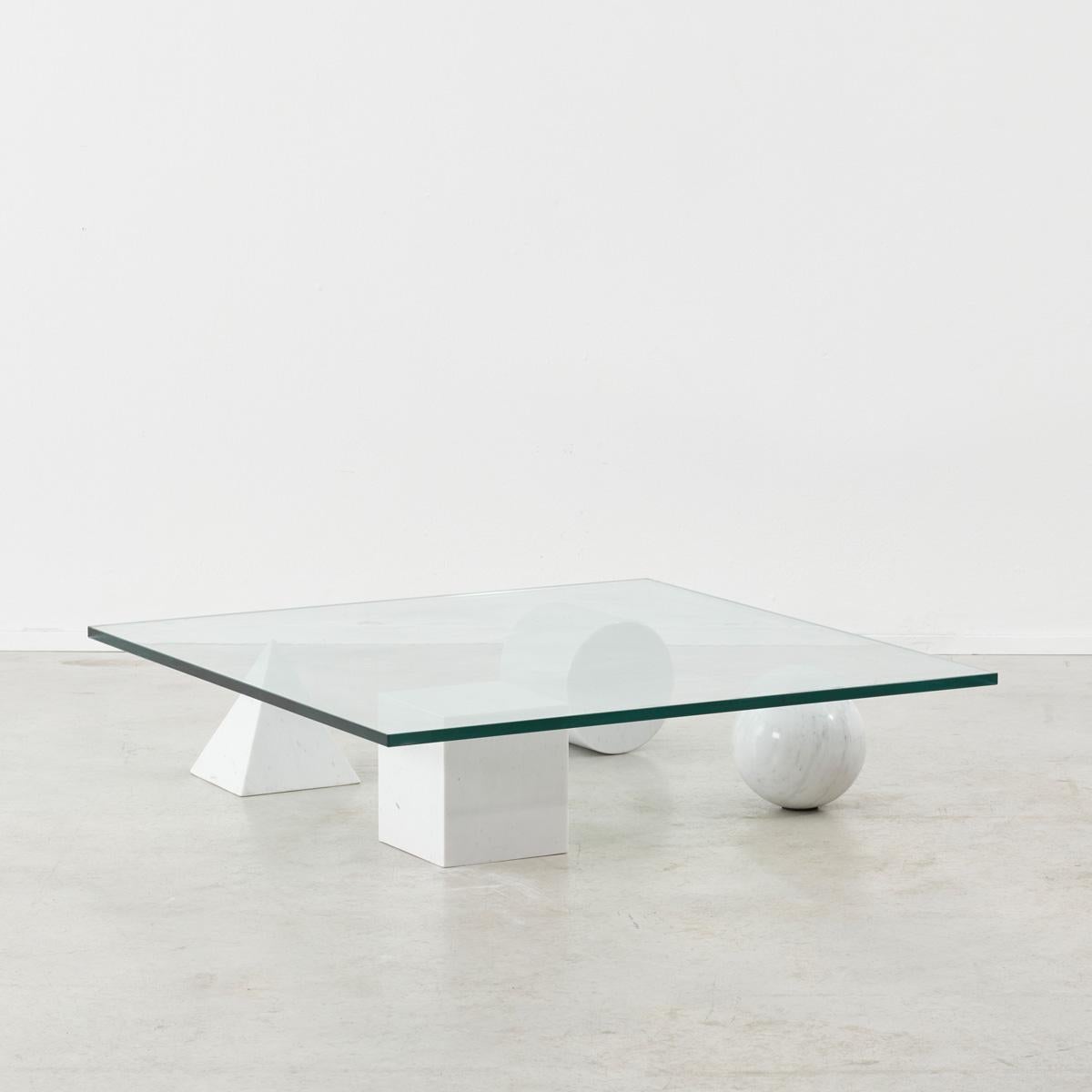 A stunning and sculptural Metafora coffee table designed by Lella and Massimo Vignelli. Inspired by the four forms of Euclidean geometery, the cube, the pyramid, the cylinder and the sphere, the four elements can be positioned freely for a unique