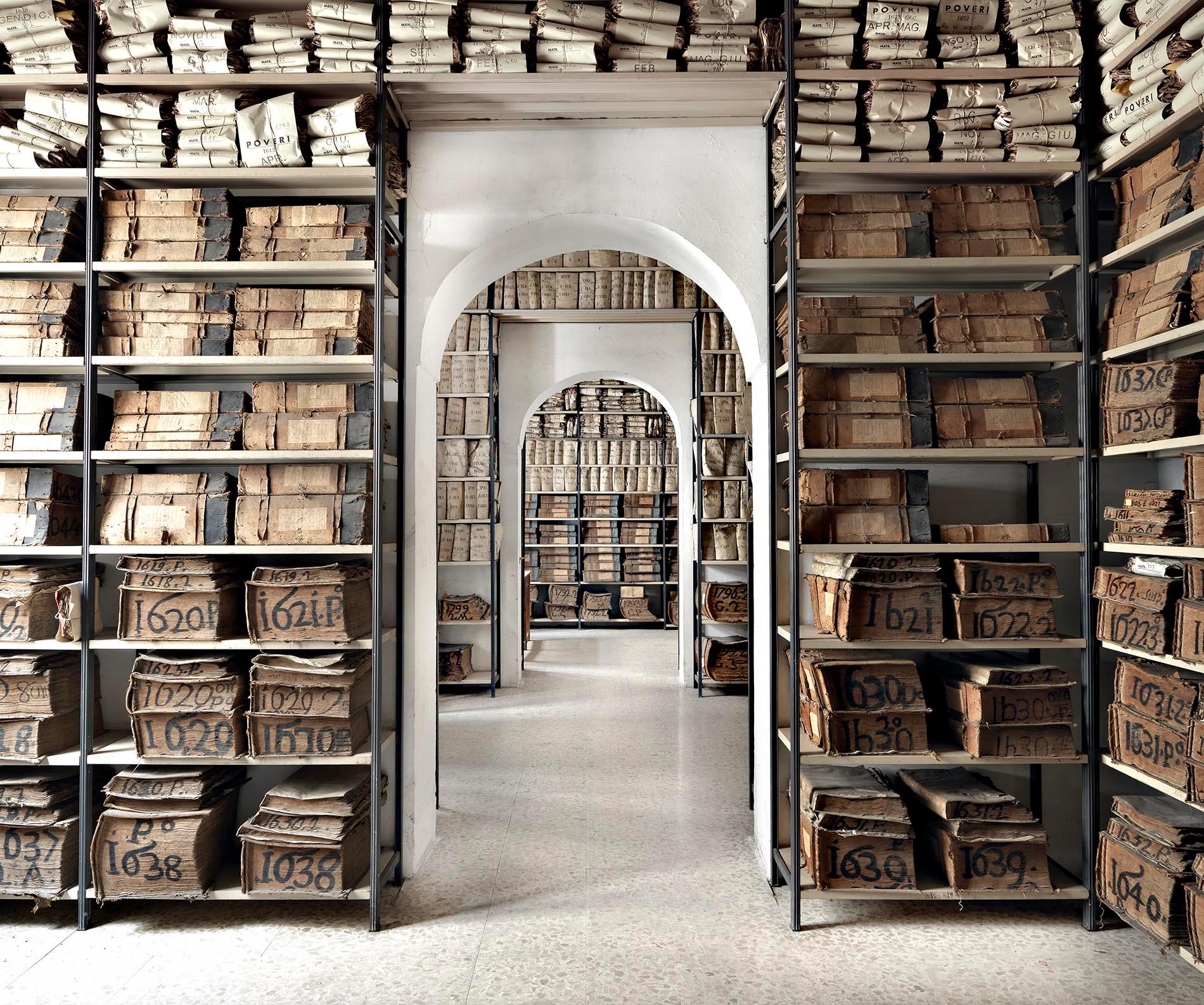 Massimo Listri Still-Life Photograph - Archivio Banco di Napoli I, Napoli 2013 - the inside of a library with books