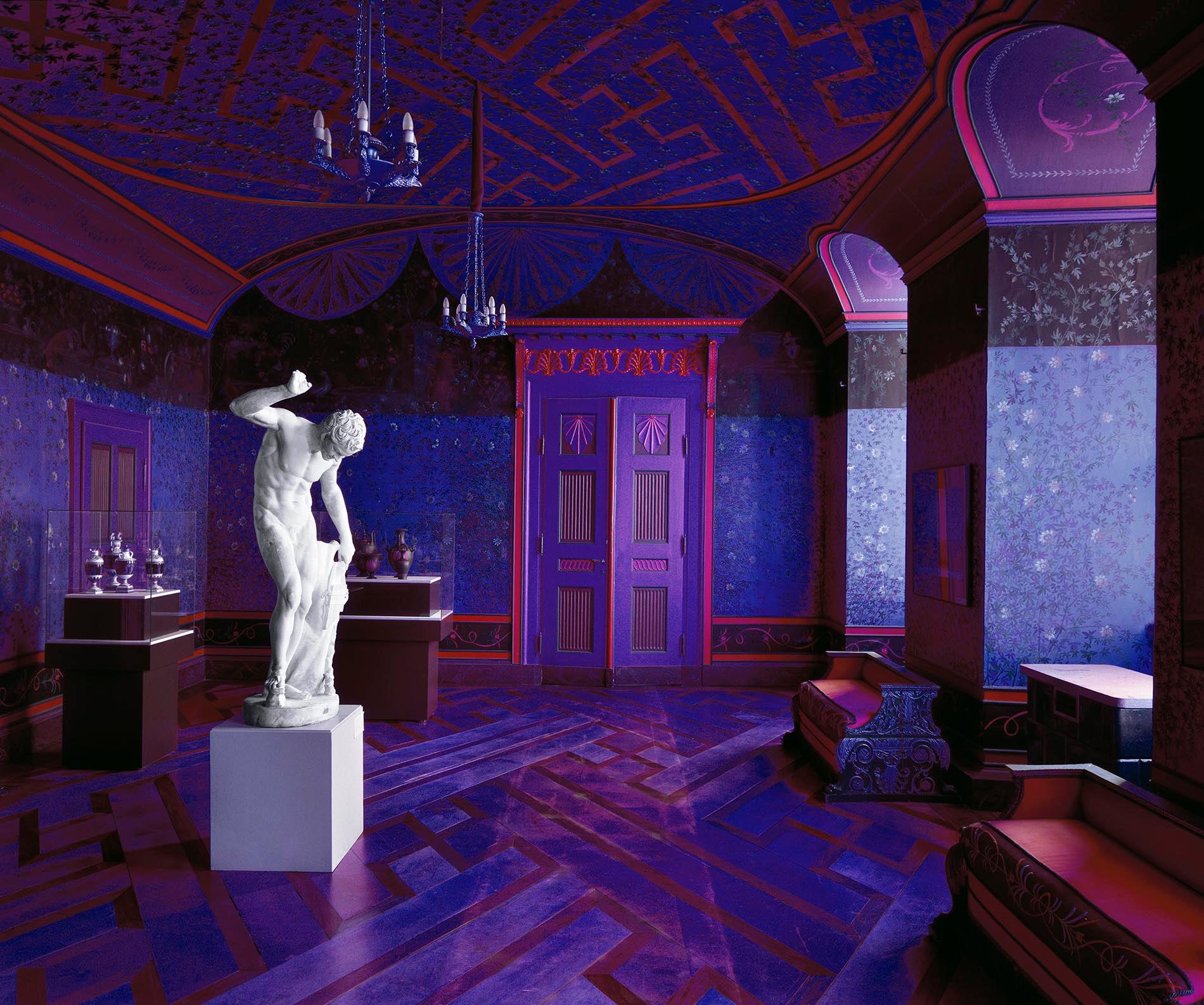 Massimo Listri Color Photograph - Castello die Friedstein, Gotha 1999 - violett interior with red an sculpture