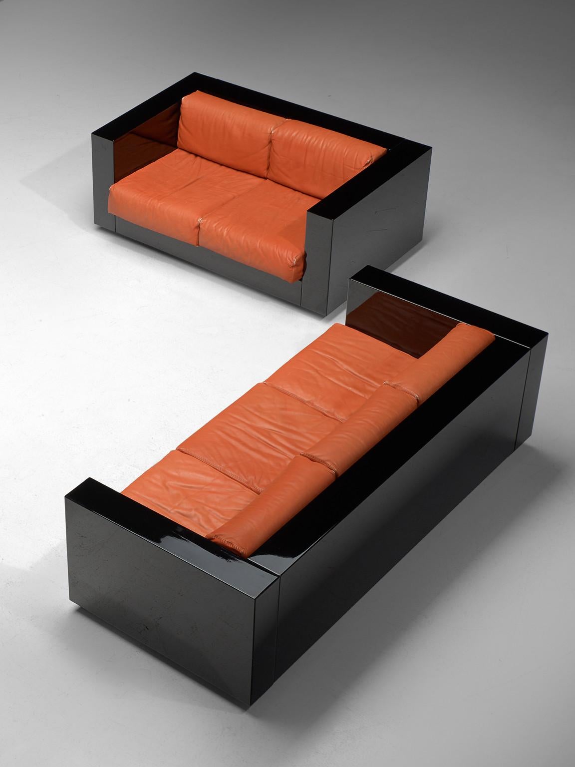 Massimo and Lella Vignelli for Poltronova, Saratoga living room set, black lacquered wood and red leather, Italy, 1964. 

This set of two sofas named 'Sartoga' is designed by Italian designer couple Lella & Massimo Vignelli. The Vignelli's were
