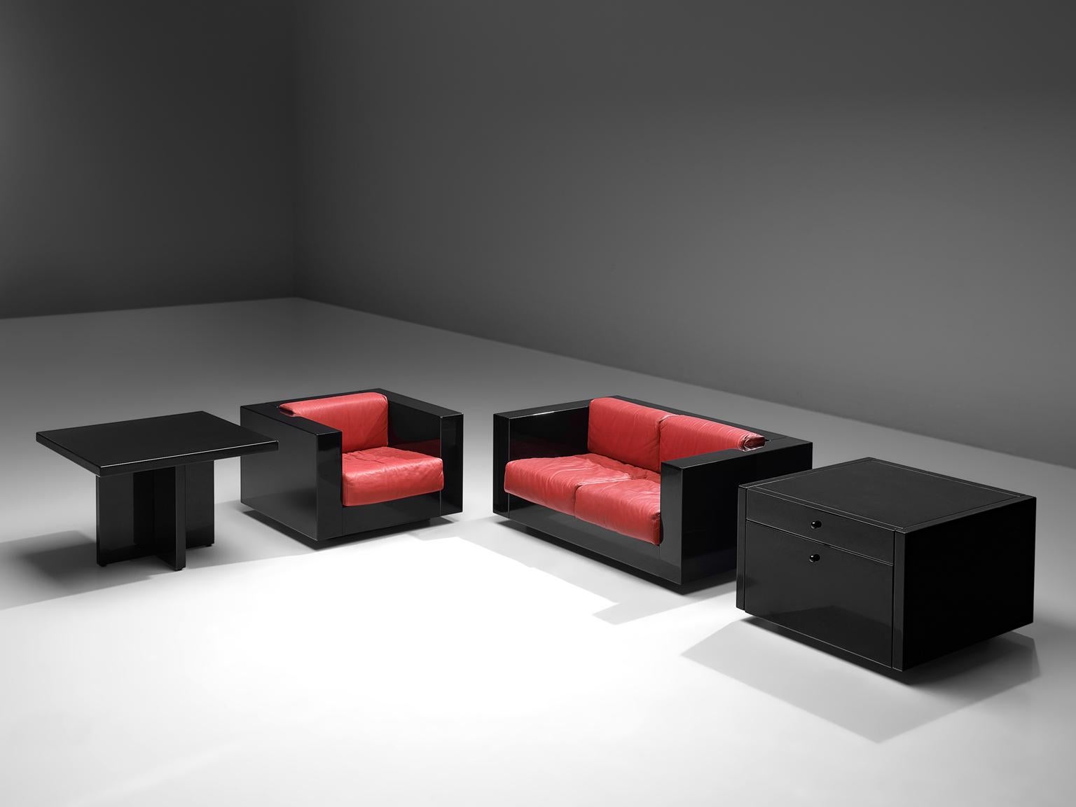 Massimo and Lella Vignelli for Poltronova, Saratoga living room set, black lacquered wood and red leather, Italy, 1964. 

This living room set named 'Sartoga' is designed by Italian designer couple Lella & Massimo Vignelli. The Vignelli's were