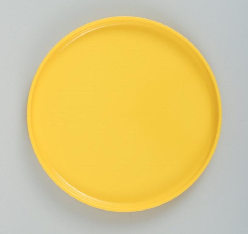 Massimo Vignelli for Heller, Italy.
A set of 6 plates in yellow melamine.
1970/80s.
Stackable.
In excellent condition.
Marked.
D 19,5 x H 2,0 cm.
 
