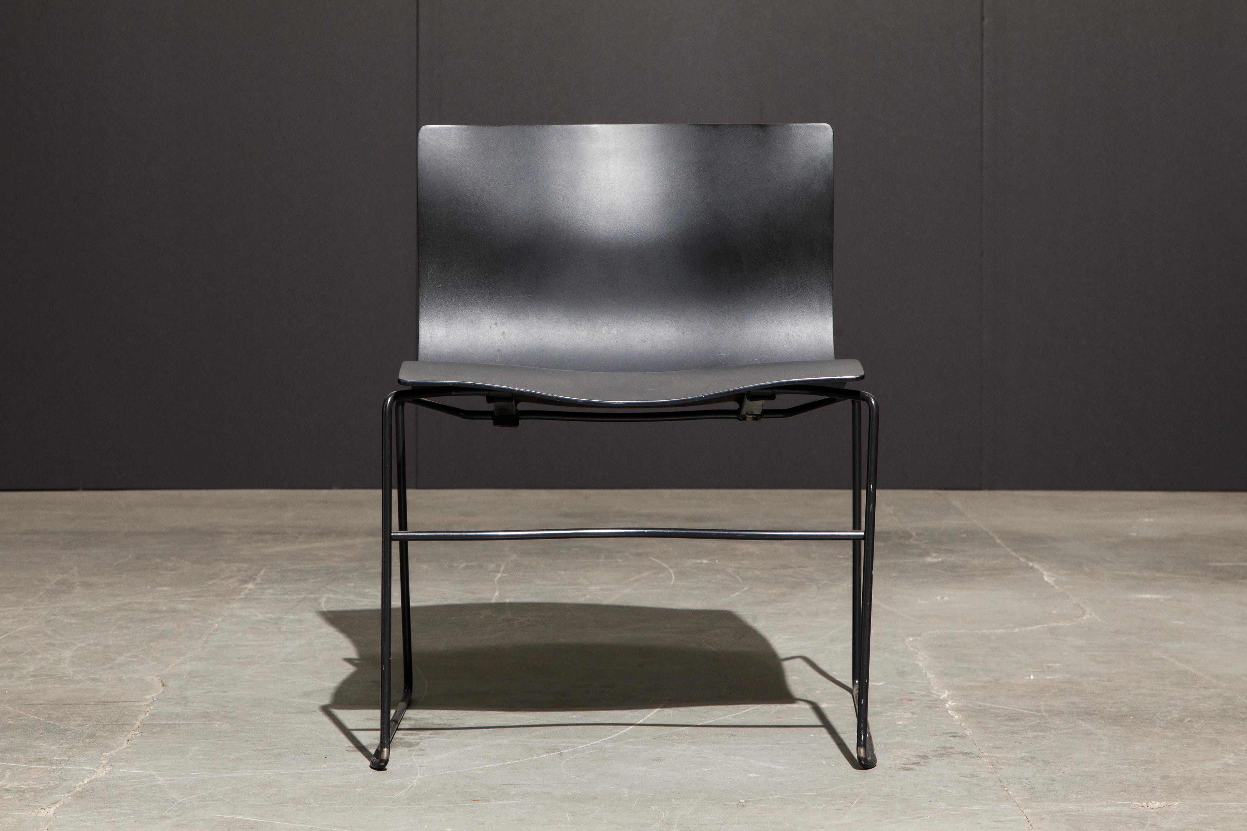 This classic Post-Modern design by Massimo and Lella Vignelli for Knoll International is called the 'Handkerchief' stacking chair, labelled underneath with early production (original) year labels. We have over 60 of these available, in black powder