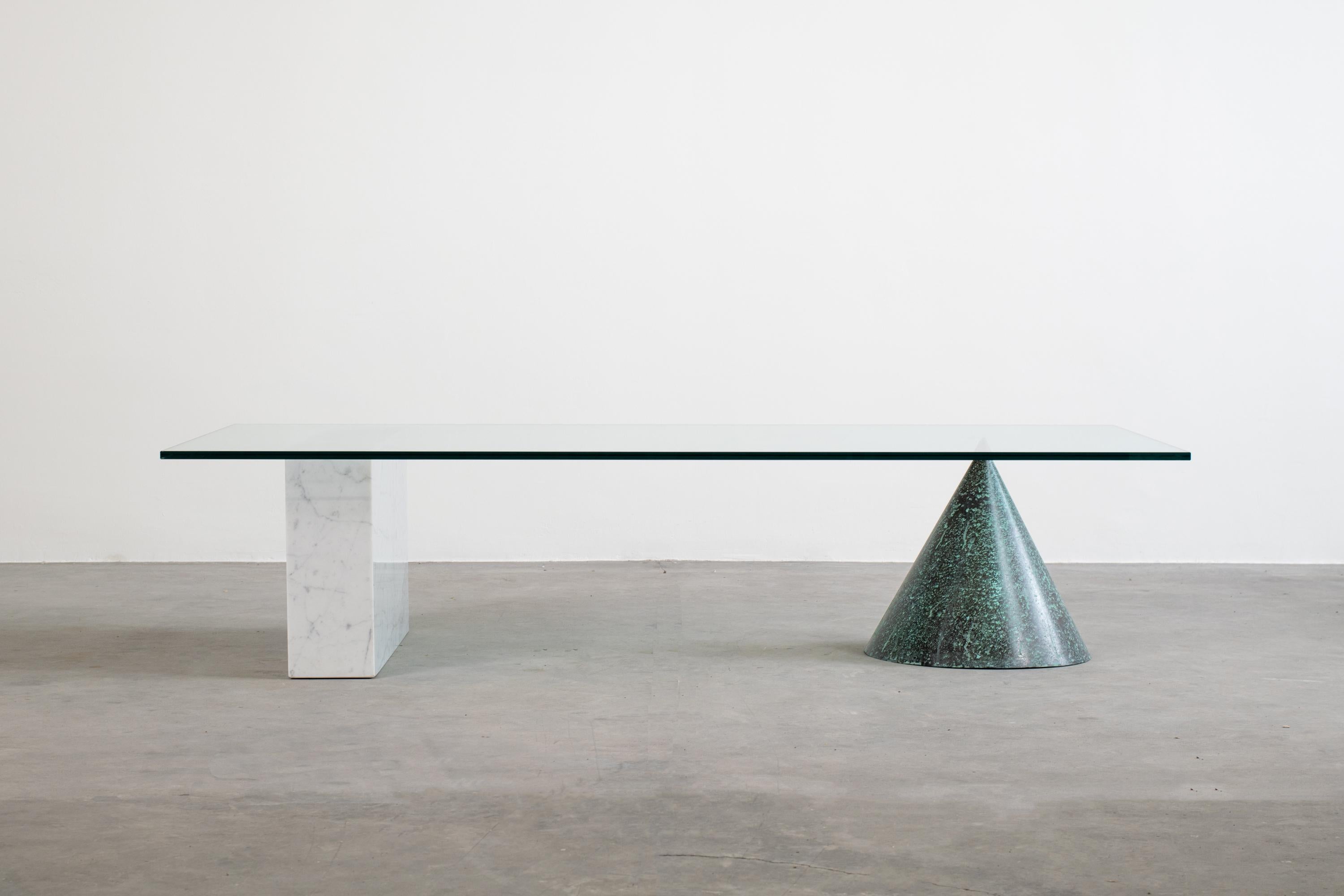 Coffee table model Kono designed by Massimo Vignelli and manufactured by Casigliani in 1979.
Low table with supports in oxidized copper and white Carrara marble and ground glass on top.
 